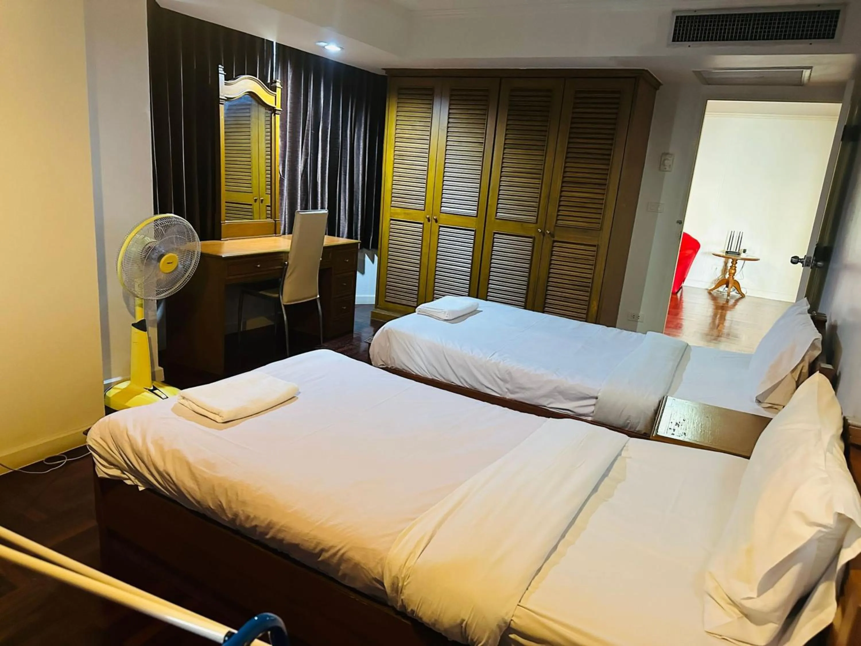 Bedroom, Bed in Omni Tower Direct Rooms - Apartments, Sukhumvit Soi 4