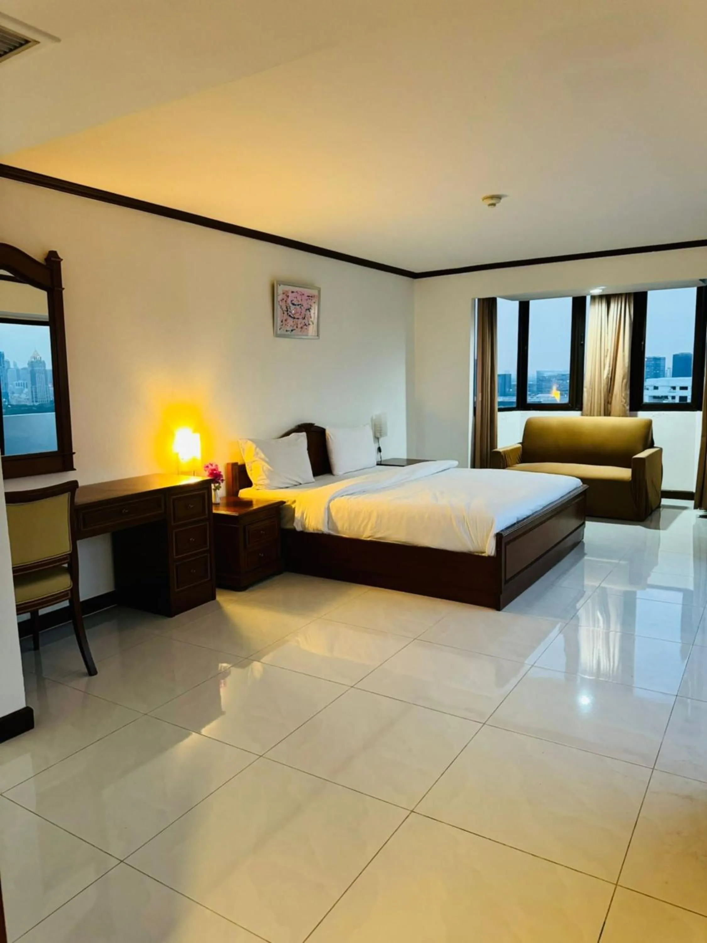 Bedroom, Bed in Omni Tower Direct Rooms - Apartments, Sukhumvit Soi 4