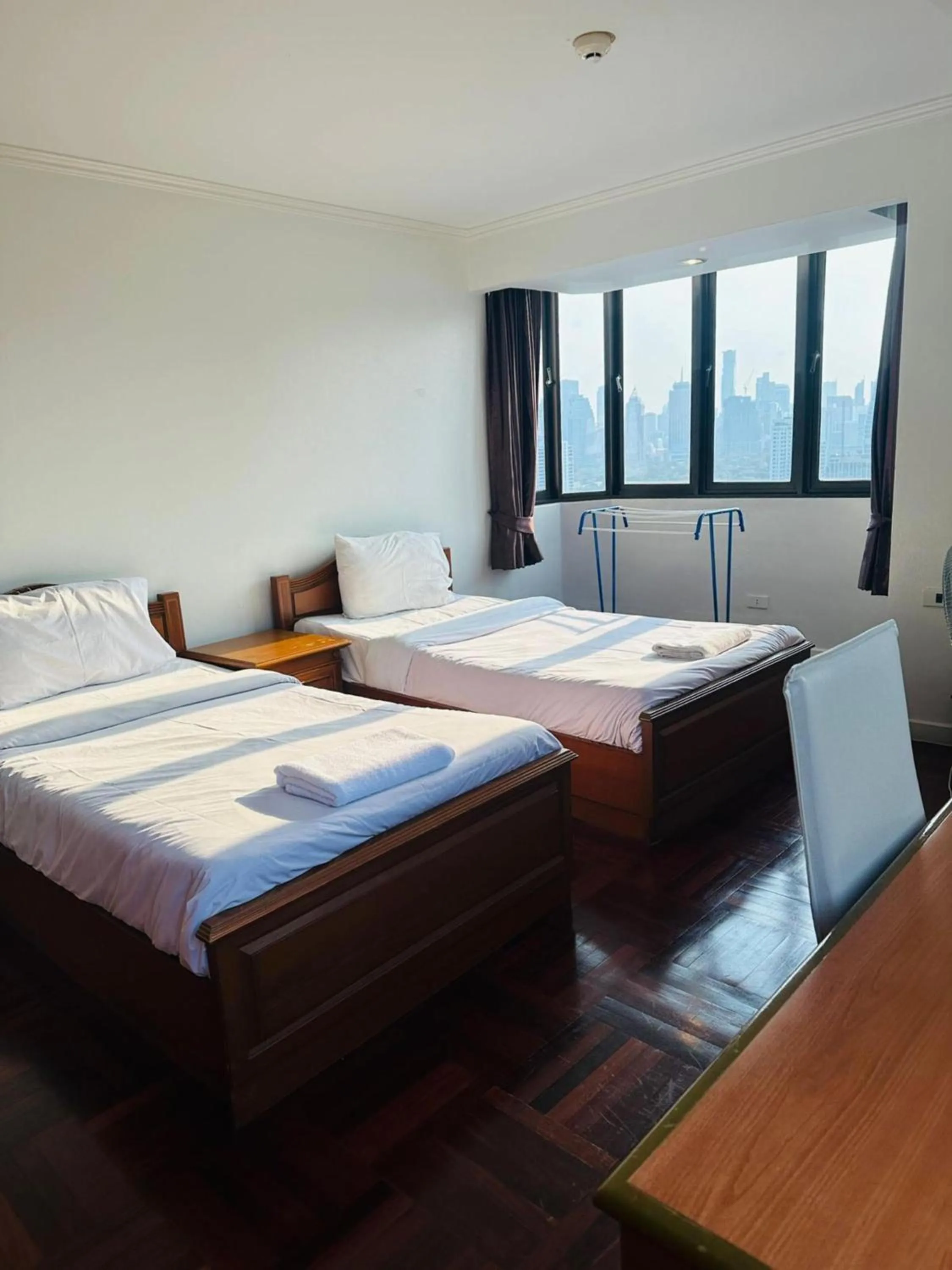 Bedroom, Bed in Omni Tower Direct Rooms - Apartments, Sukhumvit Soi 4