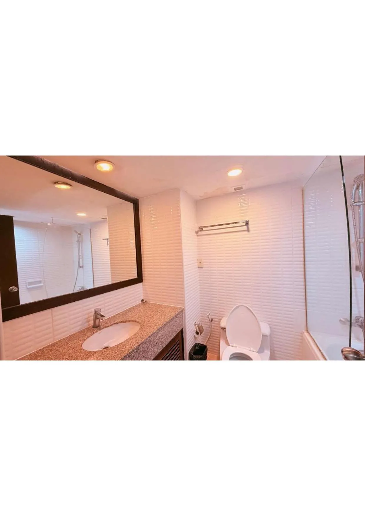 Bathroom, Bed in Omni Tower Direct Rooms - Apartments, Sukhumvit Soi 4