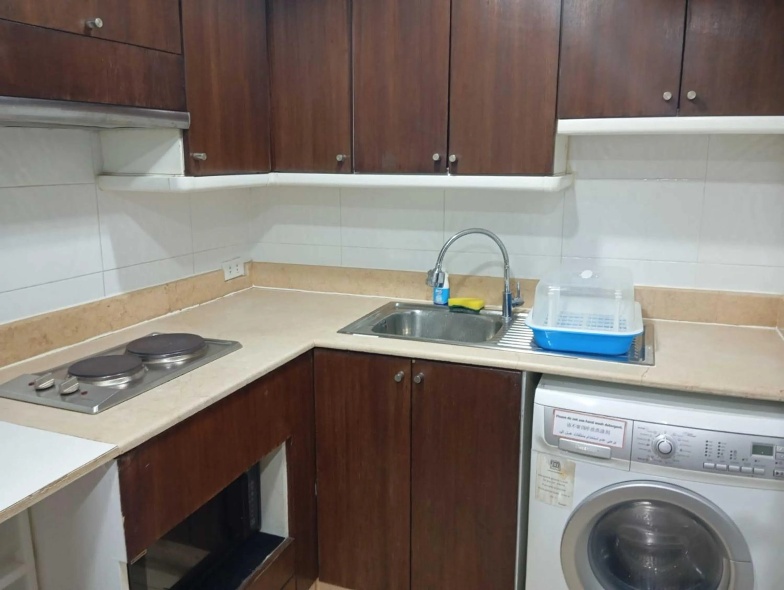 kitchen in Omni Tower Direct Rooms - Apartments, Sukhumvit Soi 4