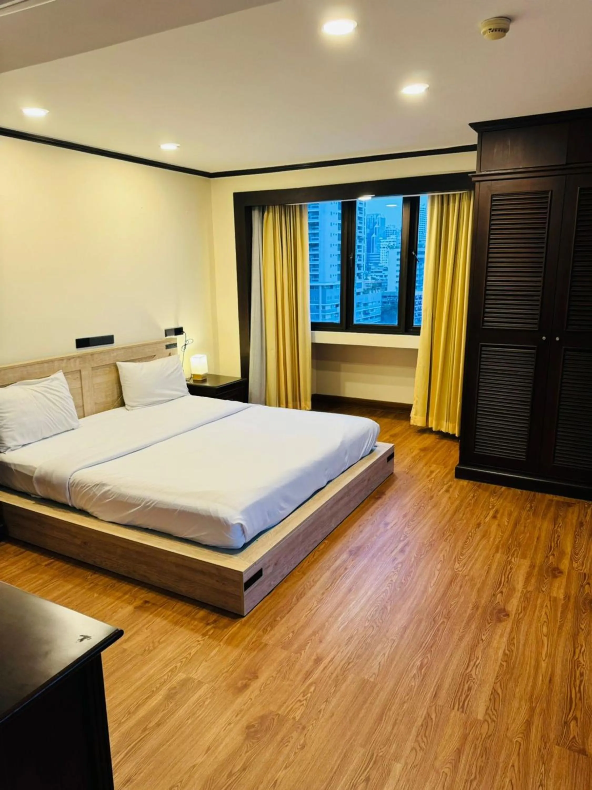 Bedroom, Bed in Omni Tower Direct Rooms - Apartments, Sukhumvit Soi 4
