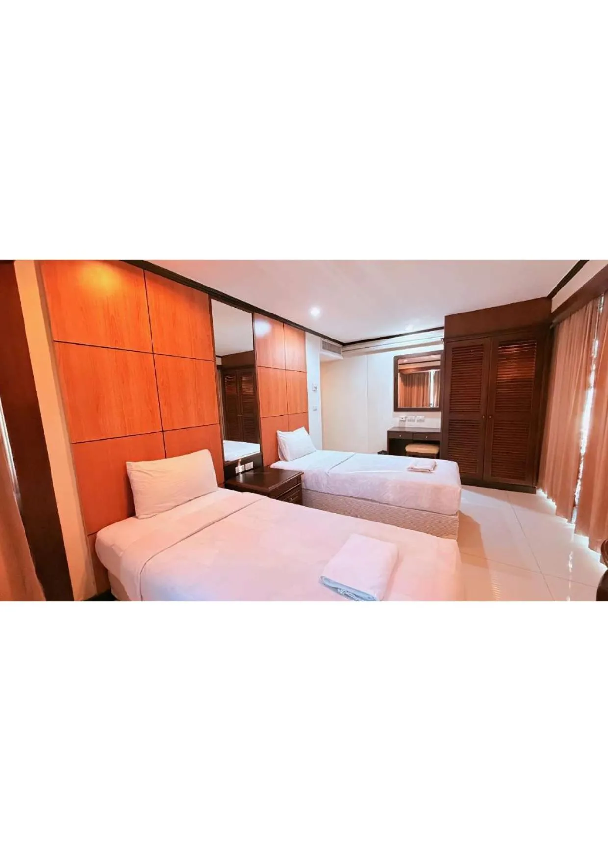 Bedroom, Bed in Omni Tower Direct Rooms - Apartments, Sukhumvit Soi 4
