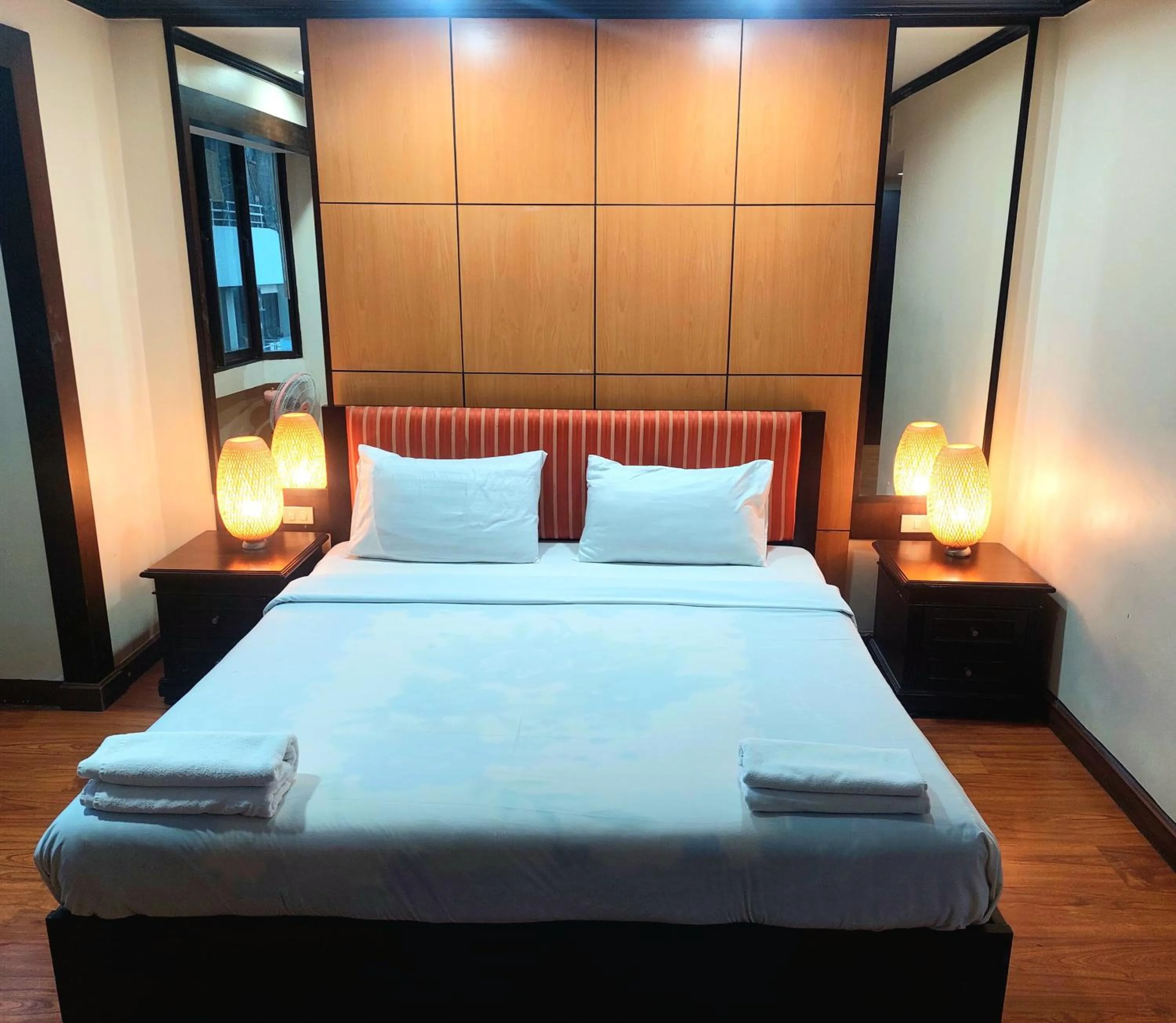Bedroom, Bed in Omni Tower Direct Rooms - Apartments, Sukhumvit Soi 4