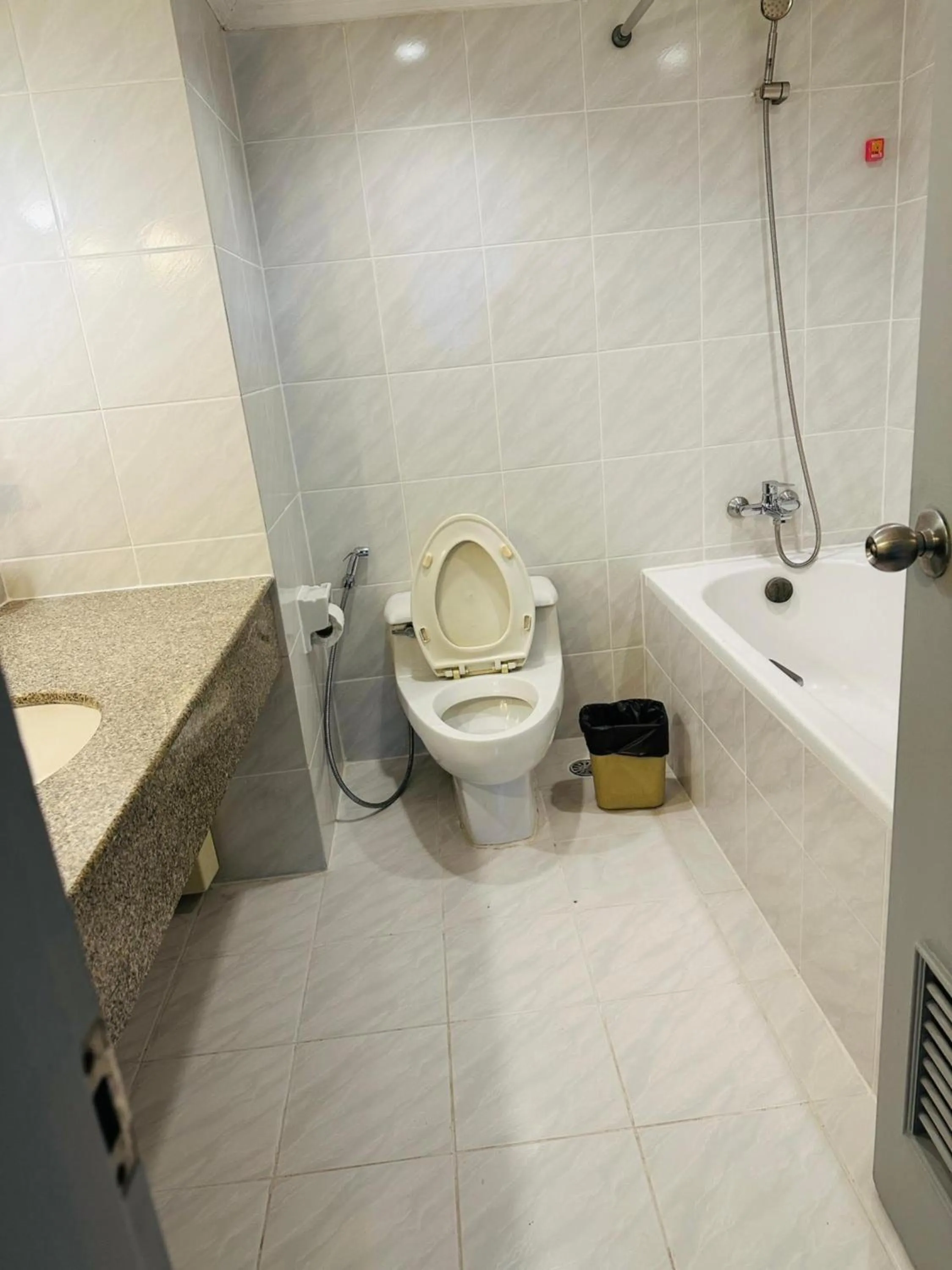 Bathroom in Omni Tower Direct Rooms - Apartments, Sukhumvit Soi 4