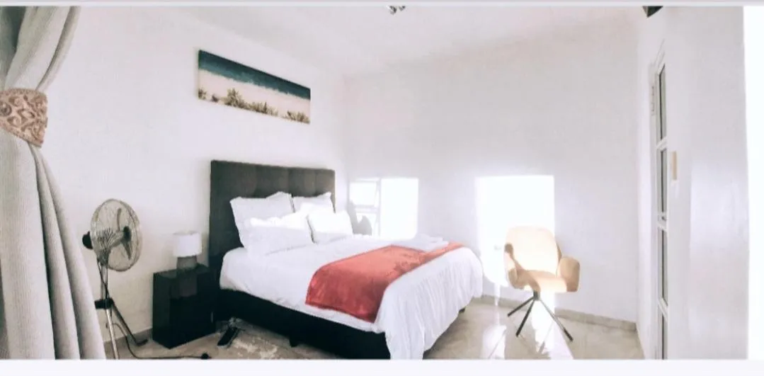 Photo of the whole room, Bed in Blue Nile Guest