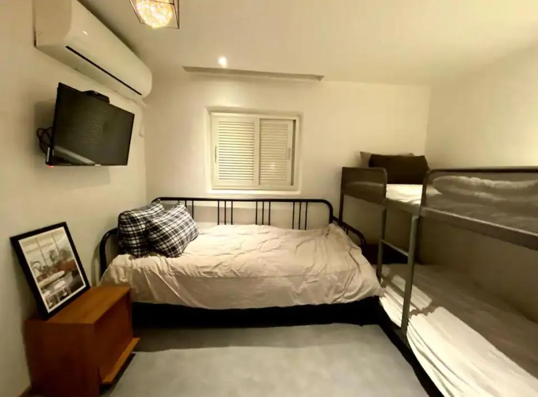 Bed in Maison Yongsan Myeongdon Hotel