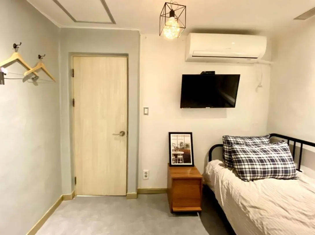 Bed in Maison Yongsan Myeongdon Hotel