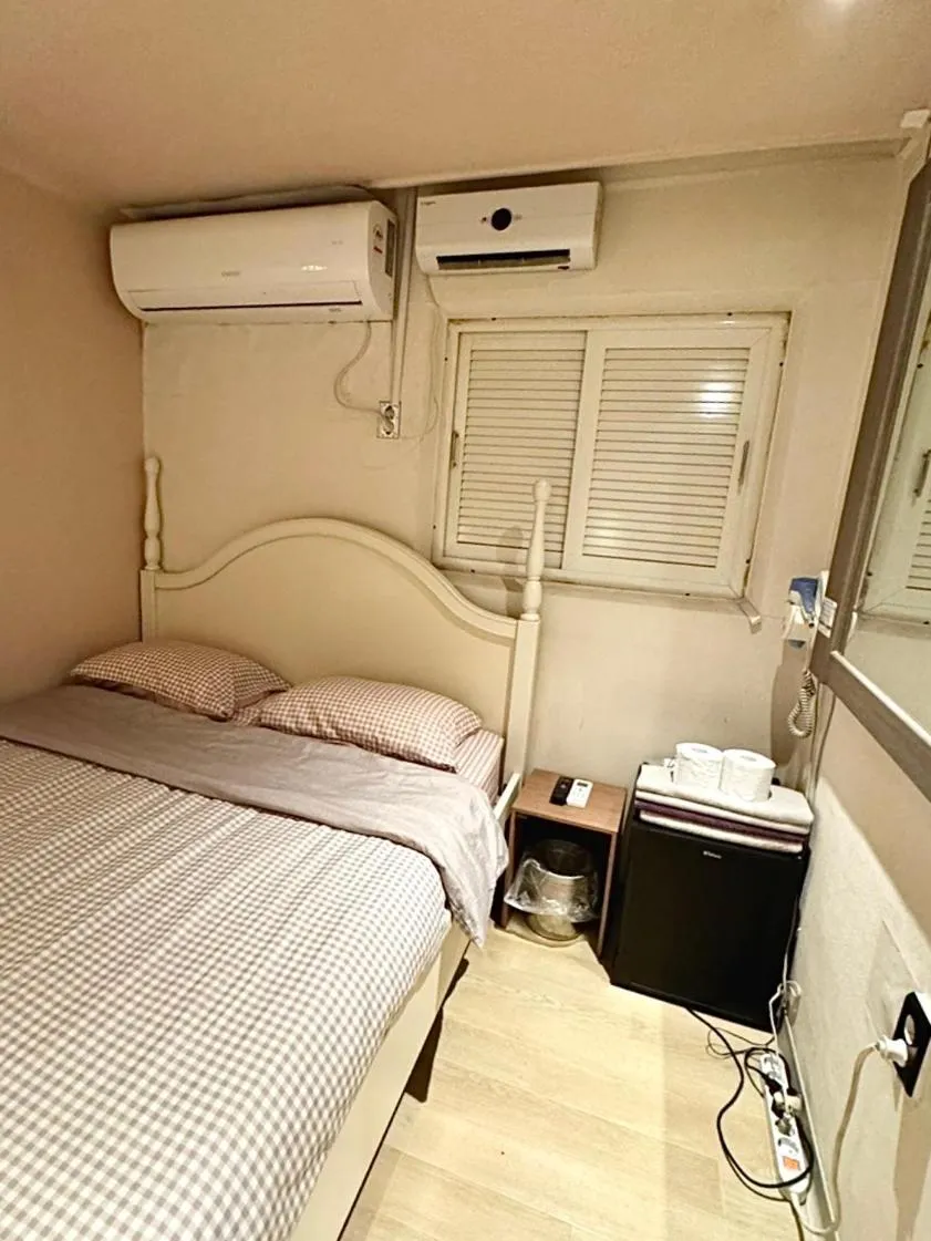 Bed in Maison Yongsan Myeongdon Hotel