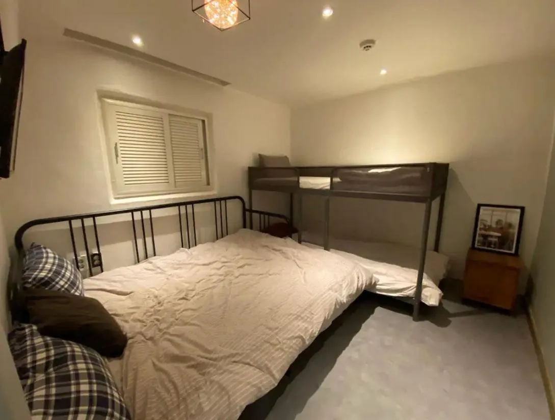 Bed in Maison Yongsan Myeongdon Hotel