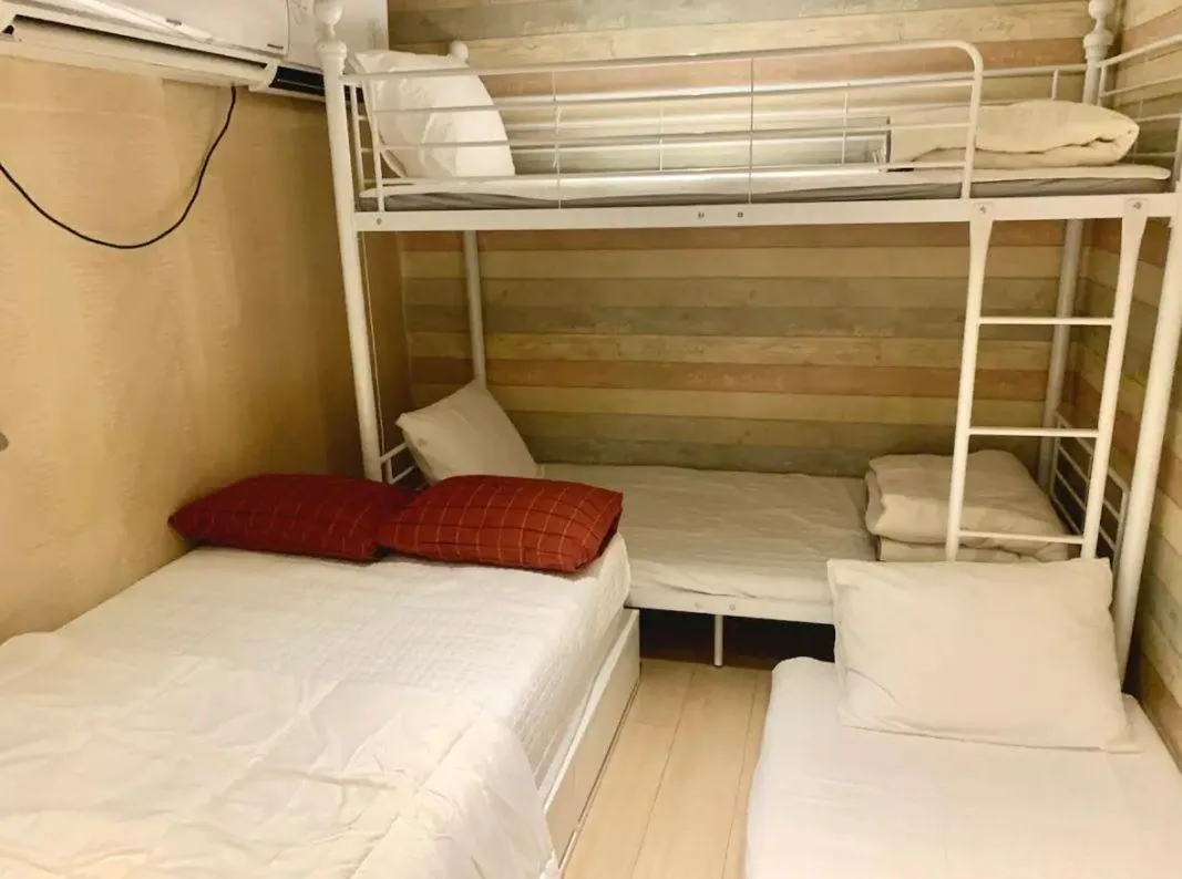 Bed in Maison Yongsan Myeongdon Hotel