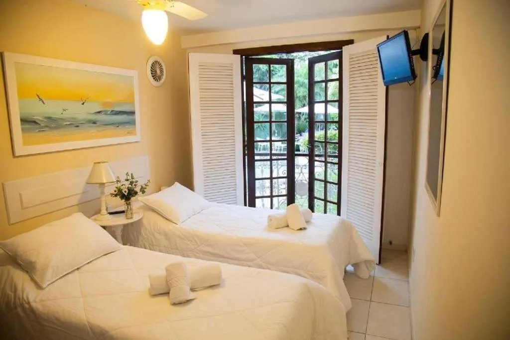 Bed in Pousada Casa da Praia Búzios