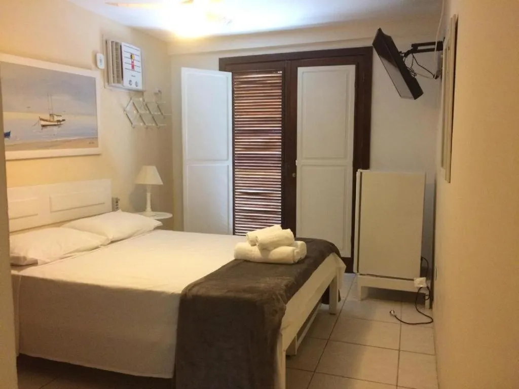 Bed in Pousada Casa da Praia Búzios