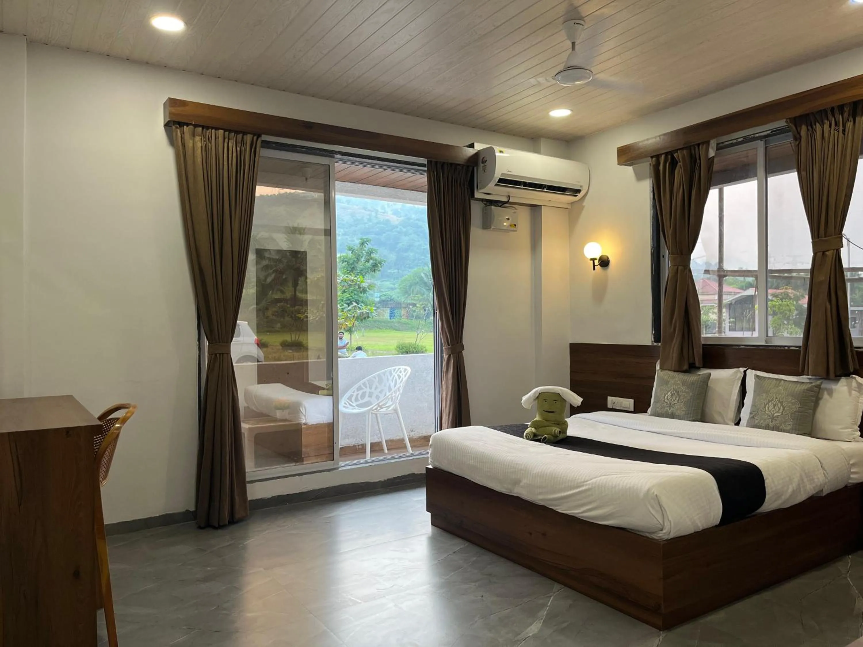Photo of the whole room, Bed in HillRock Resort & Villas, Neral-Karjat