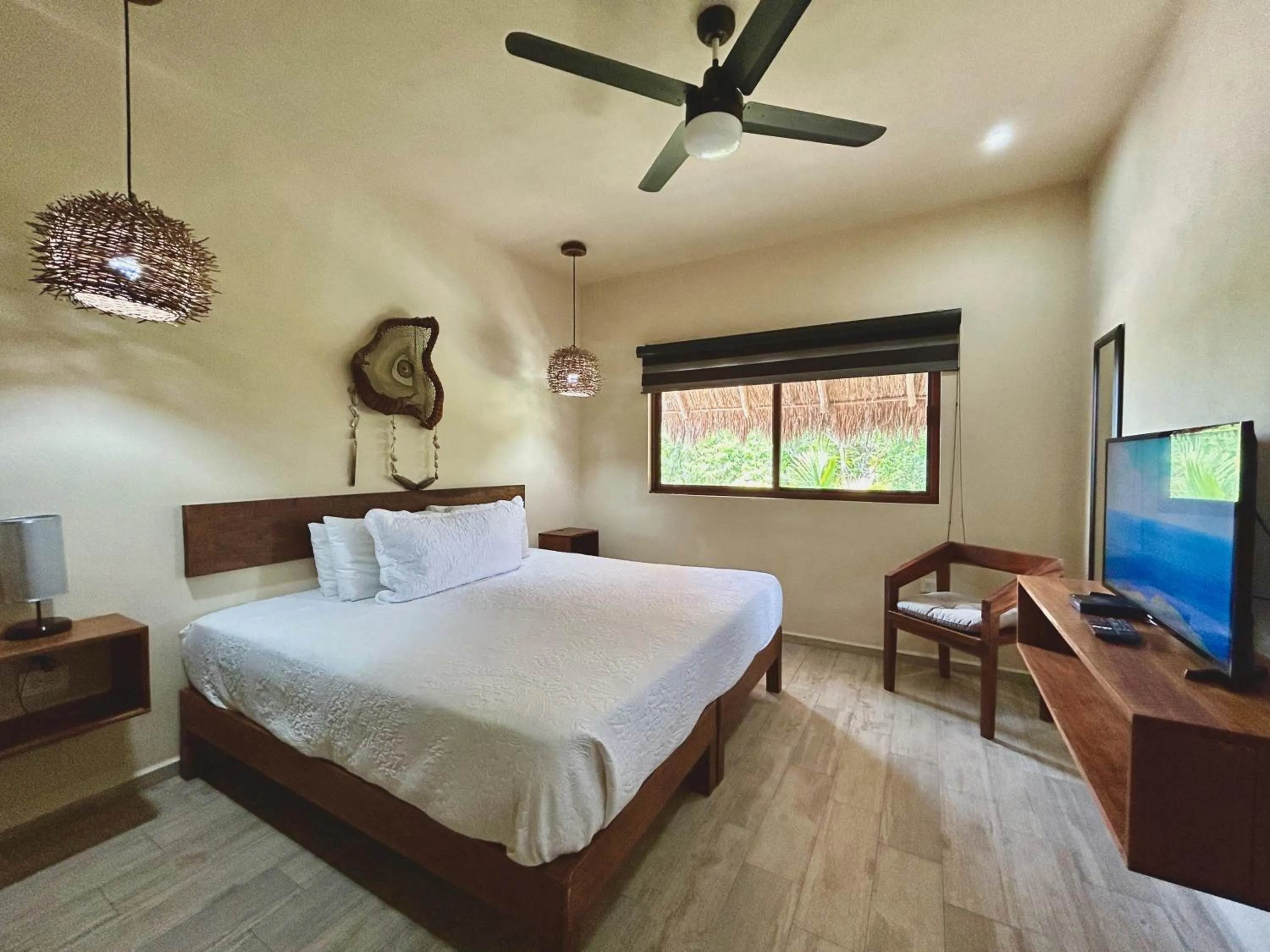 Communal lounge/ TV room, Bed in Aldea Xaan Ha Tulum