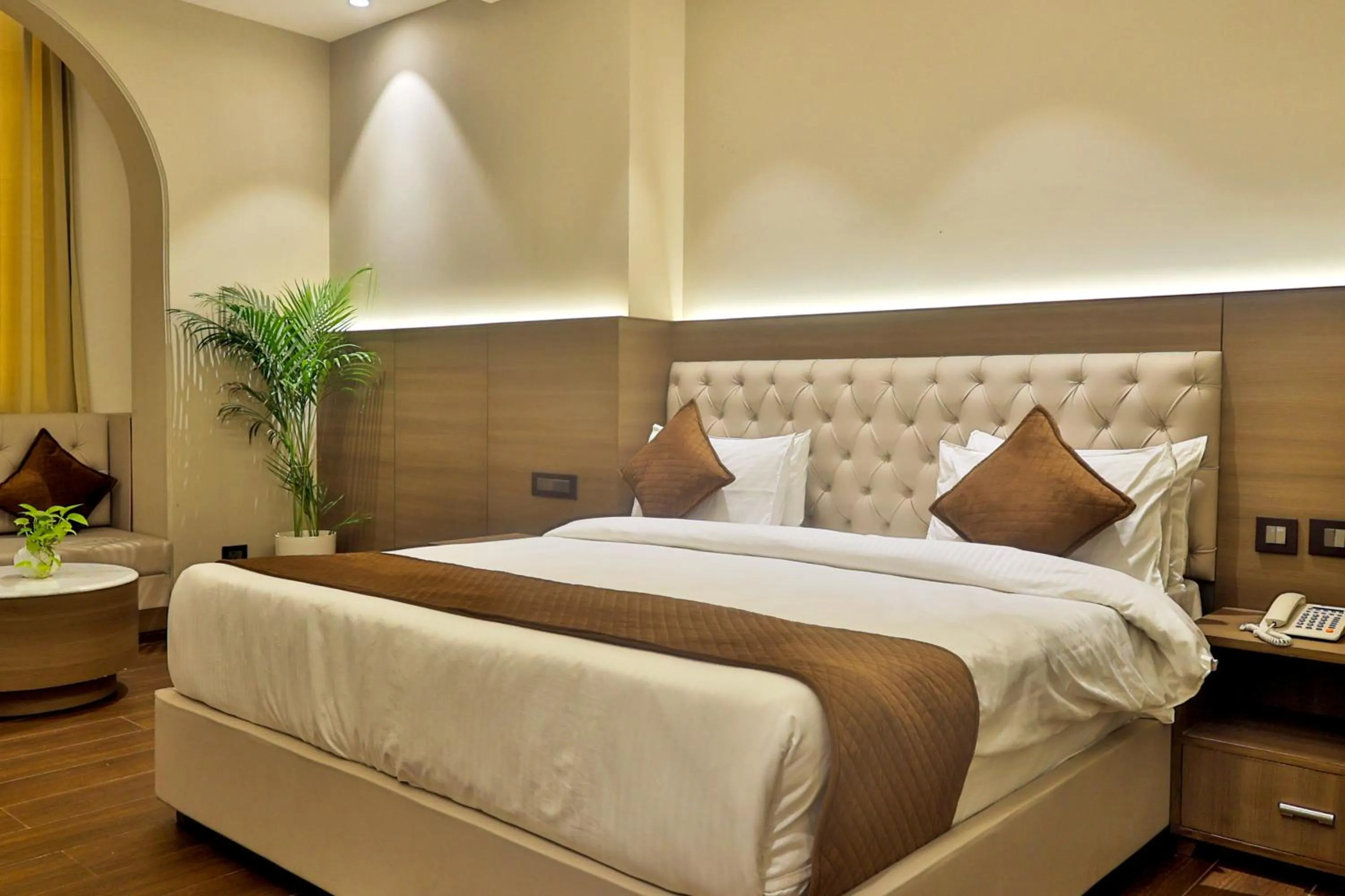 Bed in Hotel Kant Palace