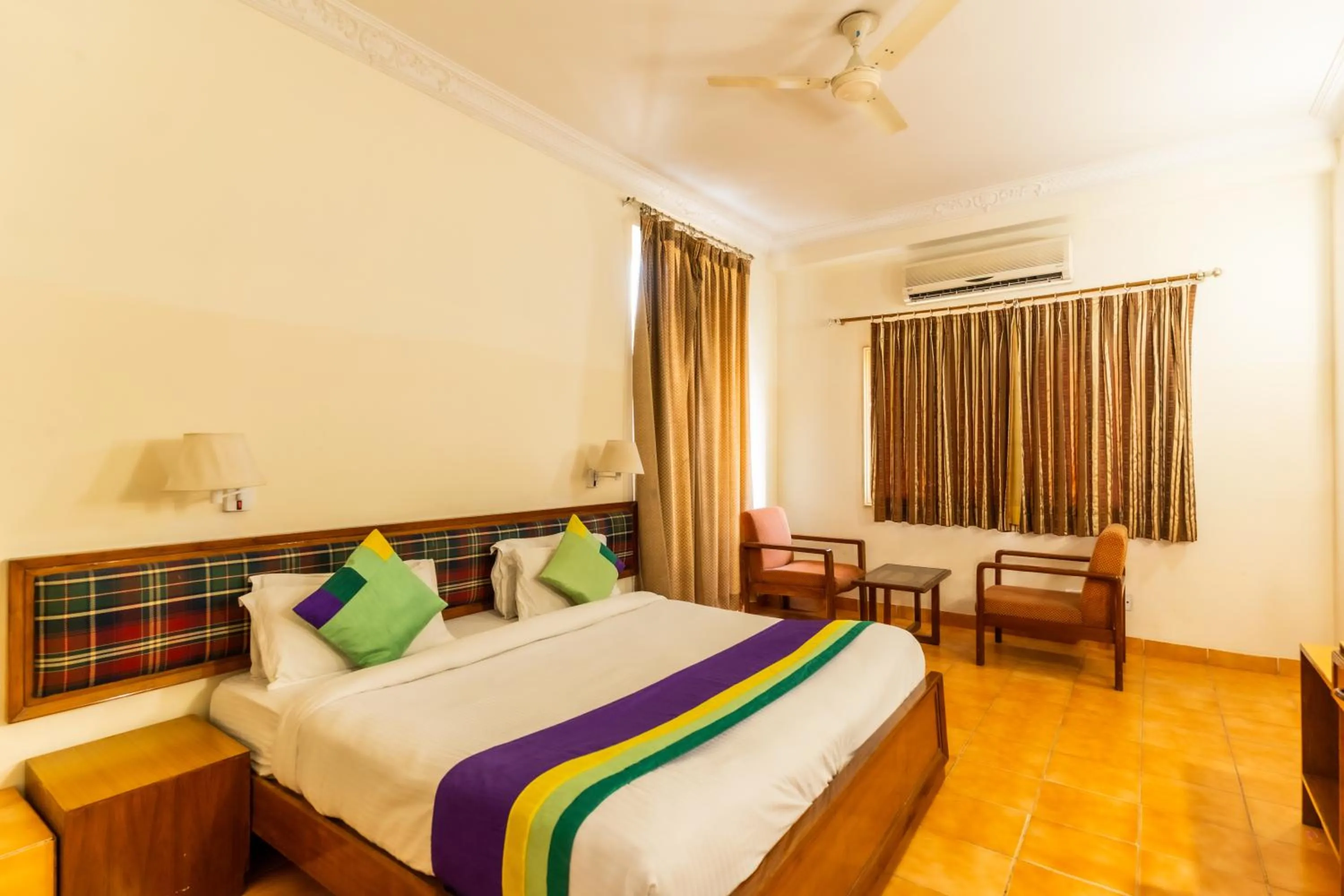 Bed in Hotel Kant Palace