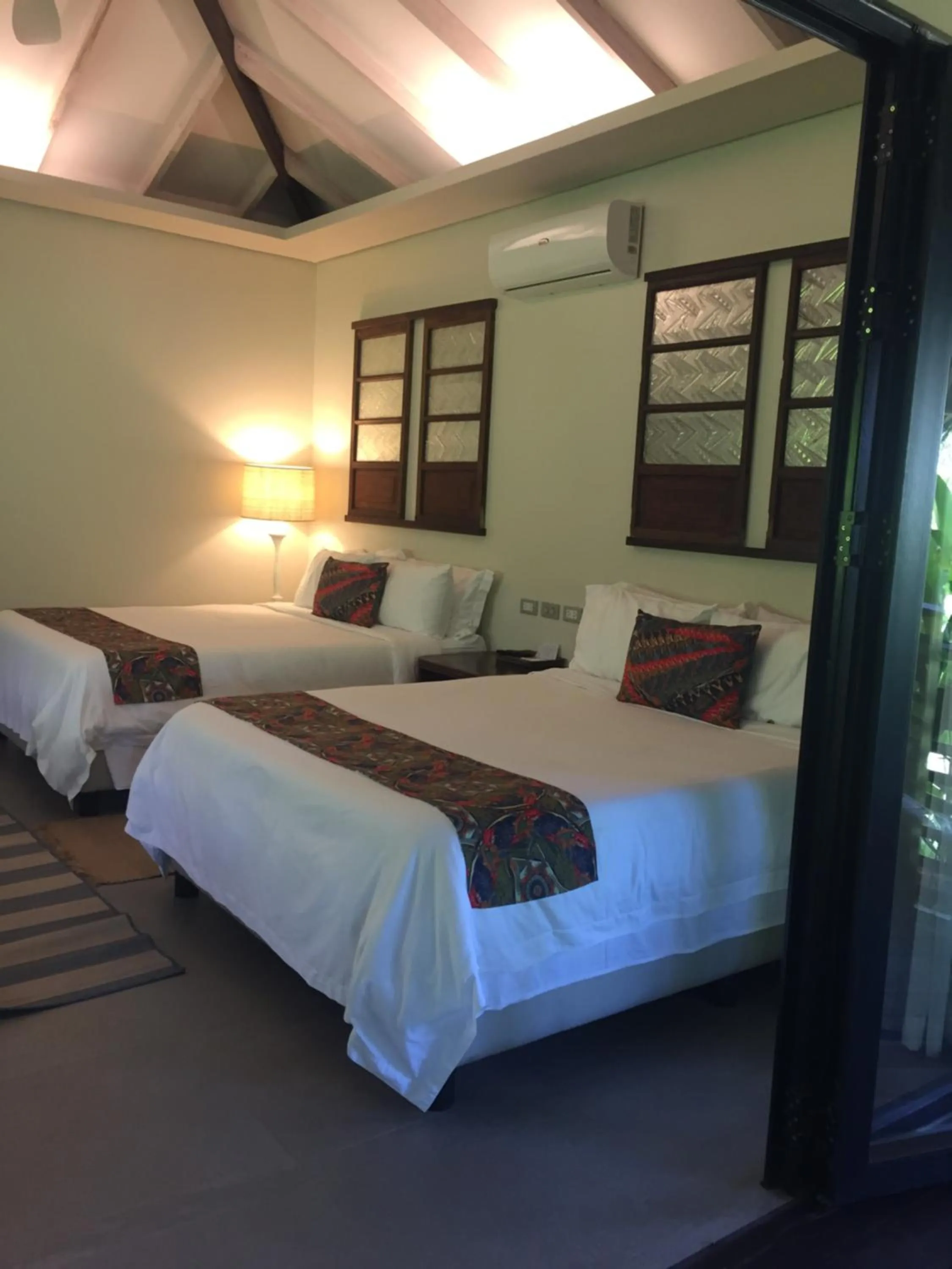Bed in Kaimana Resort Siargao
