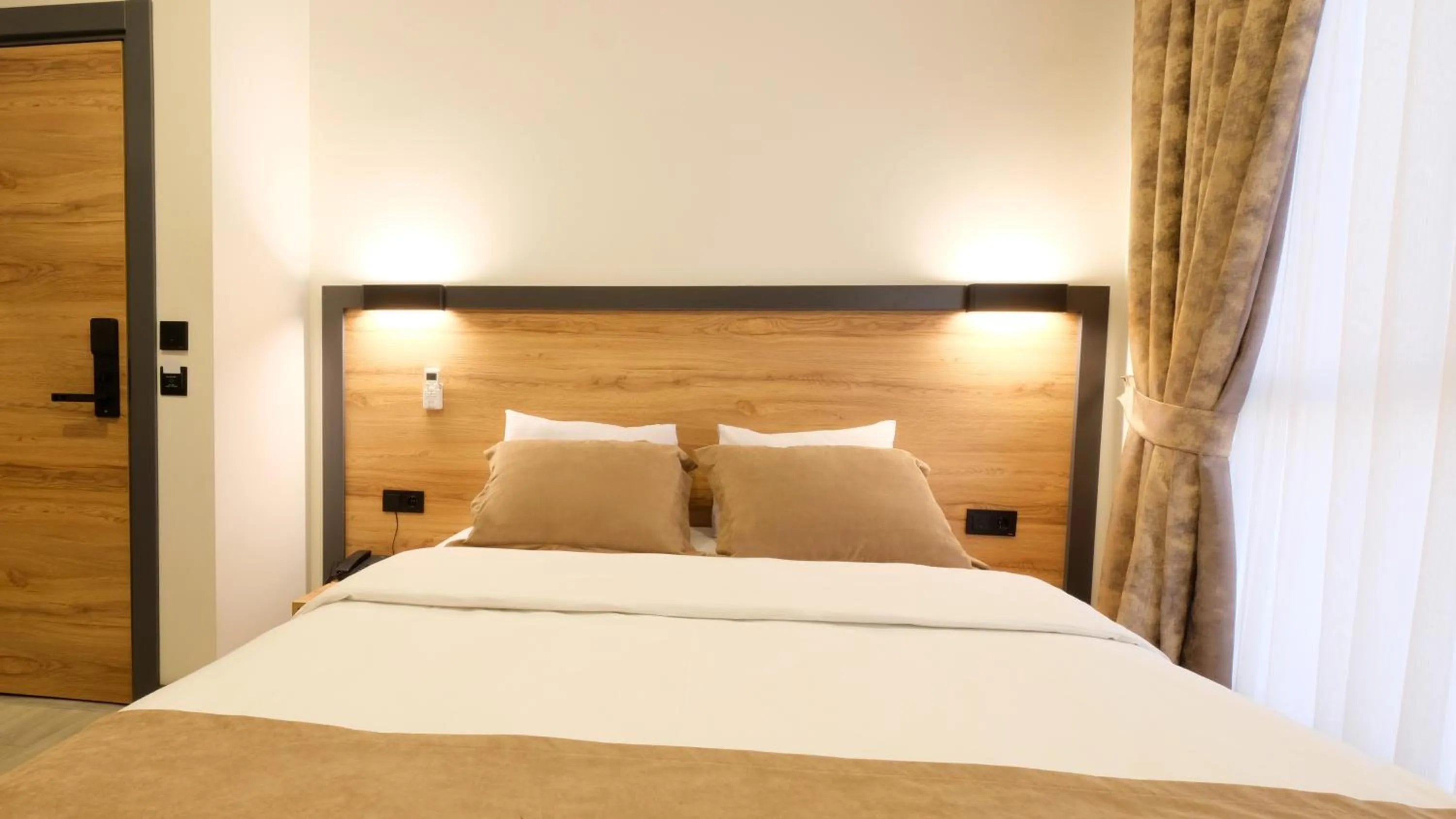 Bed in Sirius Hotel Deluxe