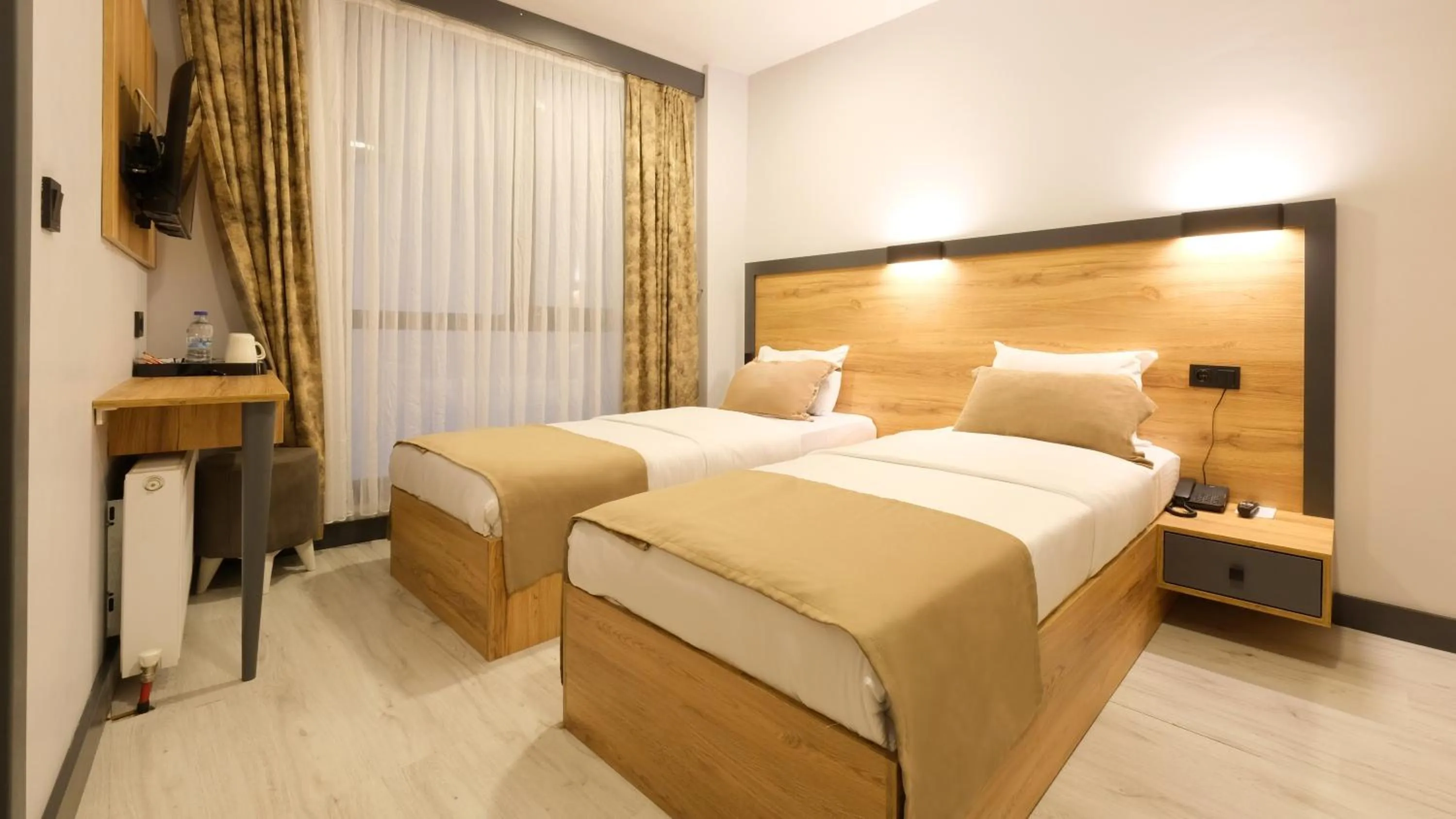 Bed in Sirius Hotel Deluxe