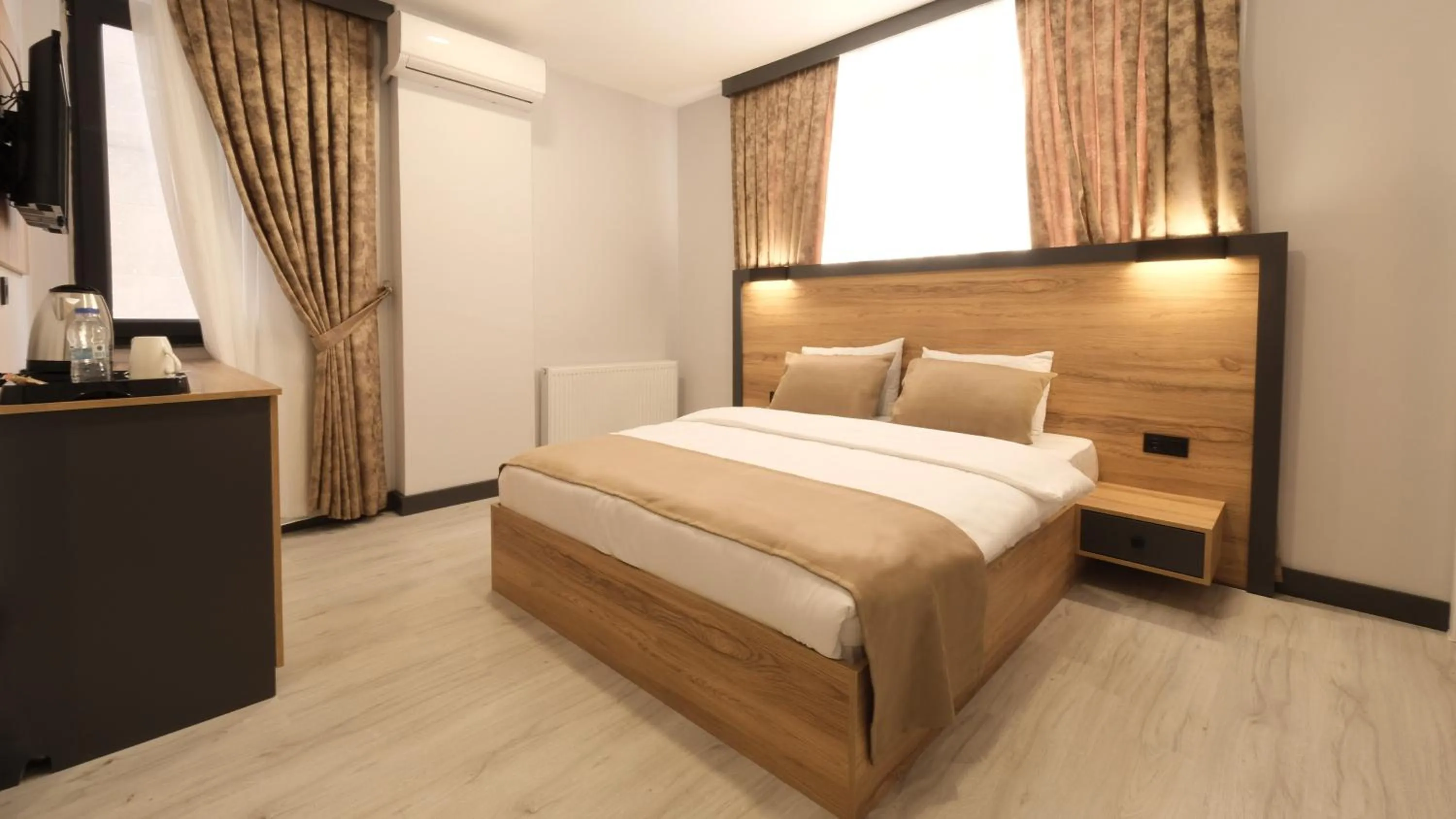 Bed in Sirius Hotel Deluxe