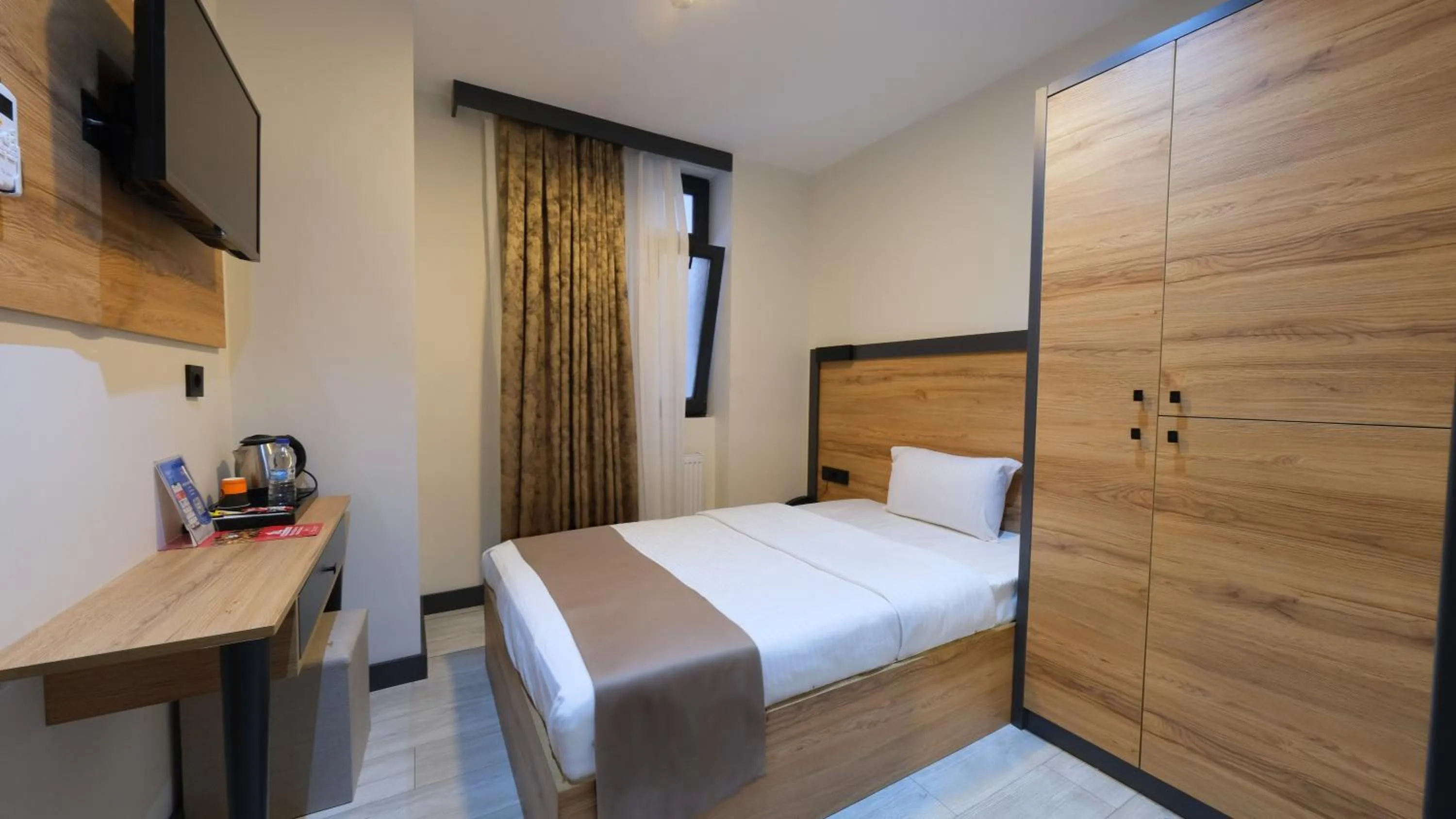 Bed in Sirius Hotel Deluxe