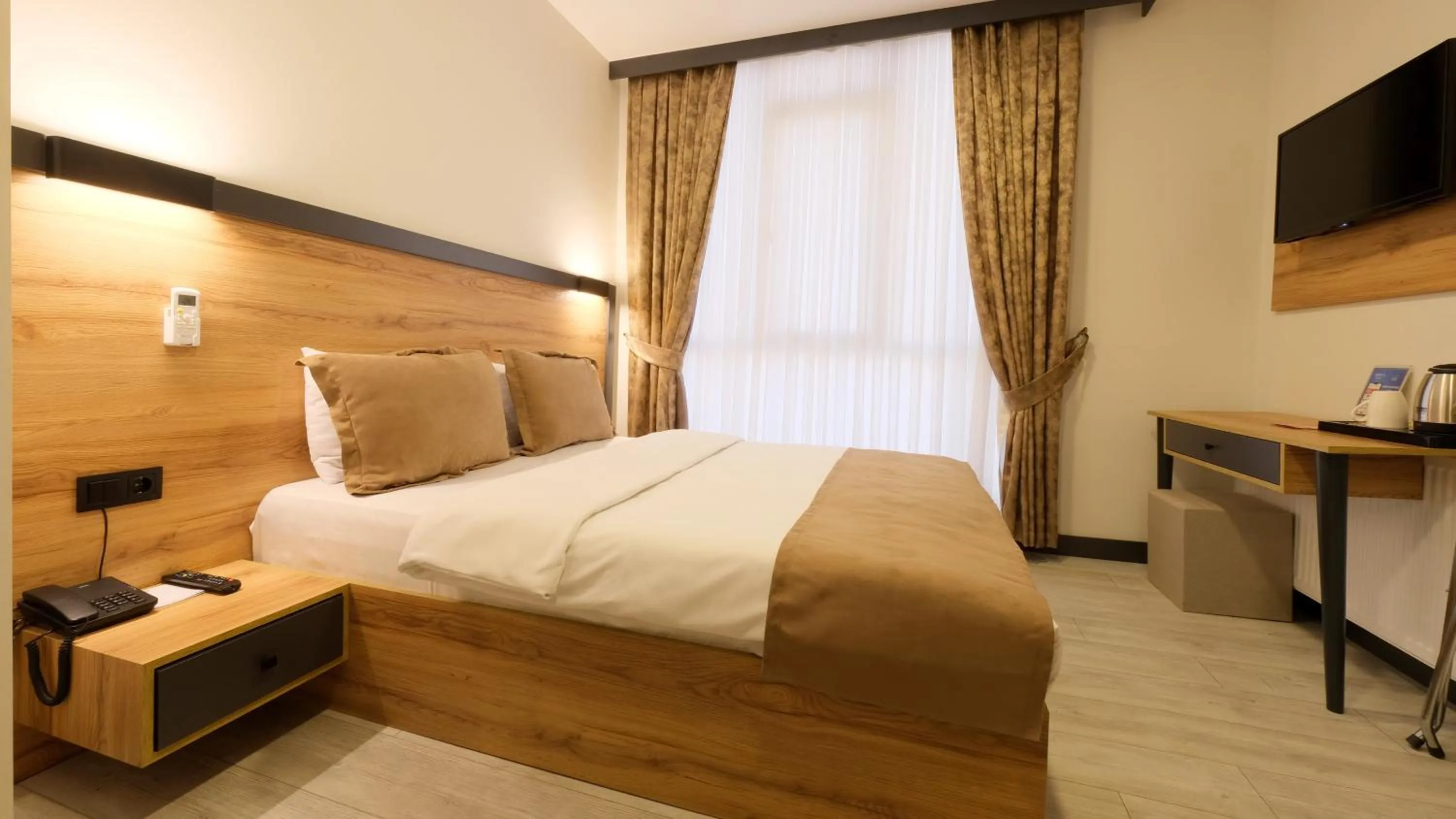 Bed in Sirius Hotel Deluxe