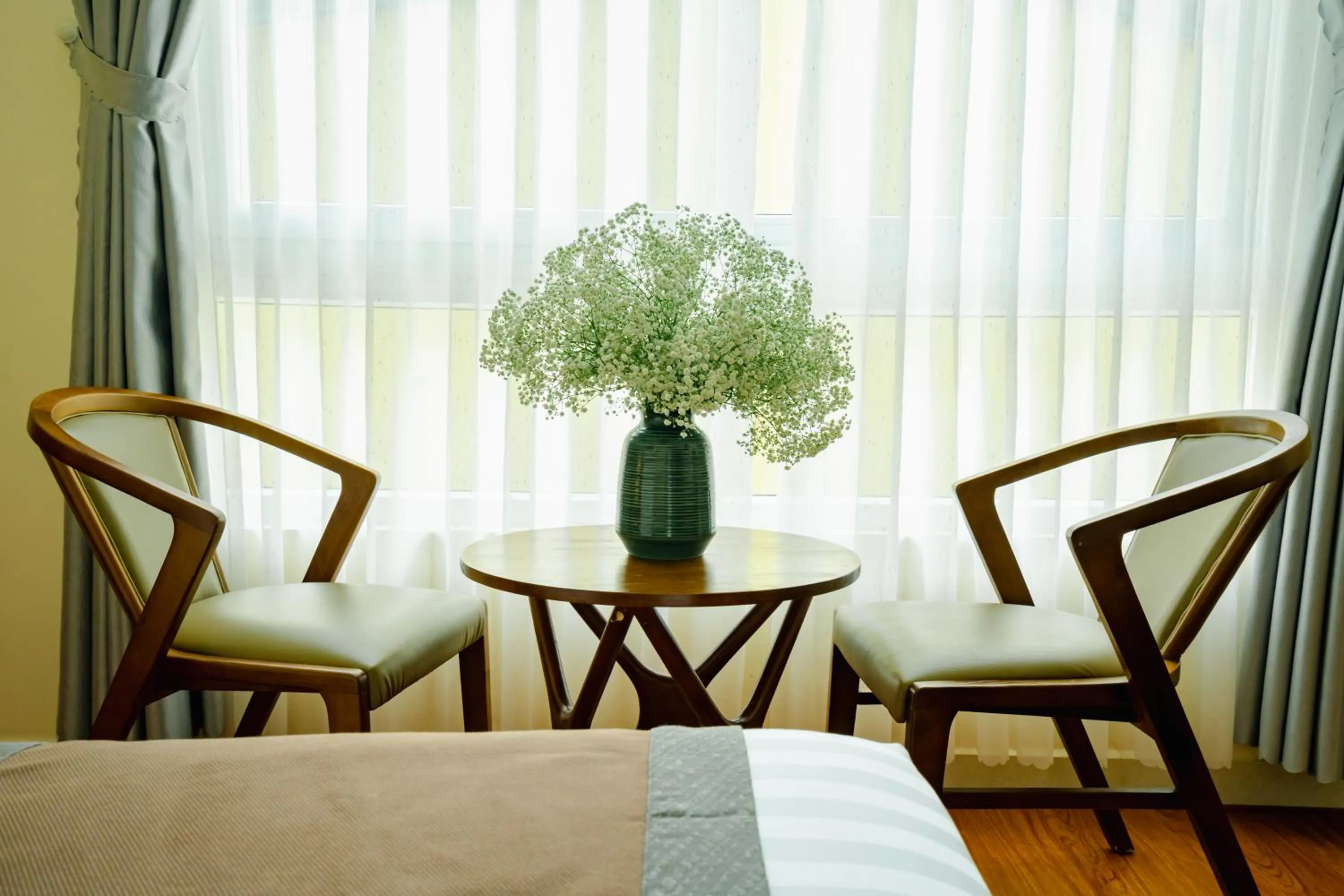 Seating area in Bombo DaLat Hotel