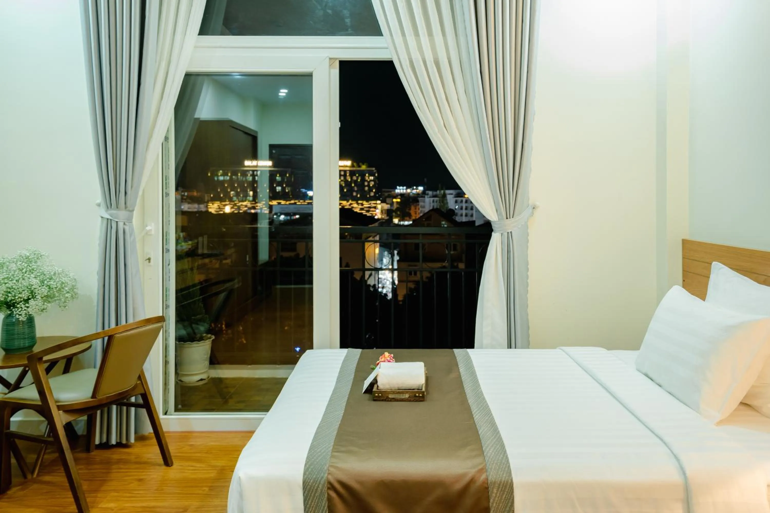 View (from property/room), Bed in Bombo DaLat Hotel