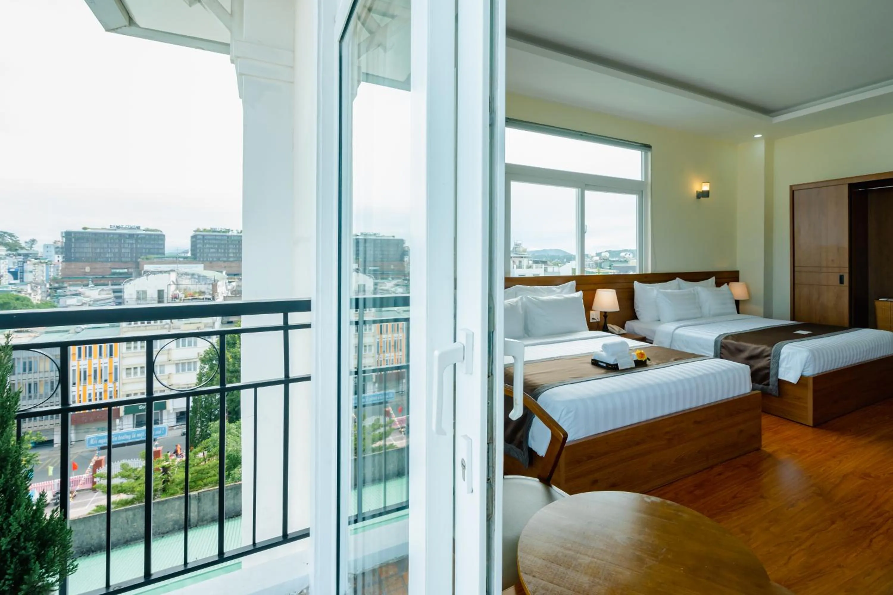 Property building, Bed in Bombo DaLat Hotel