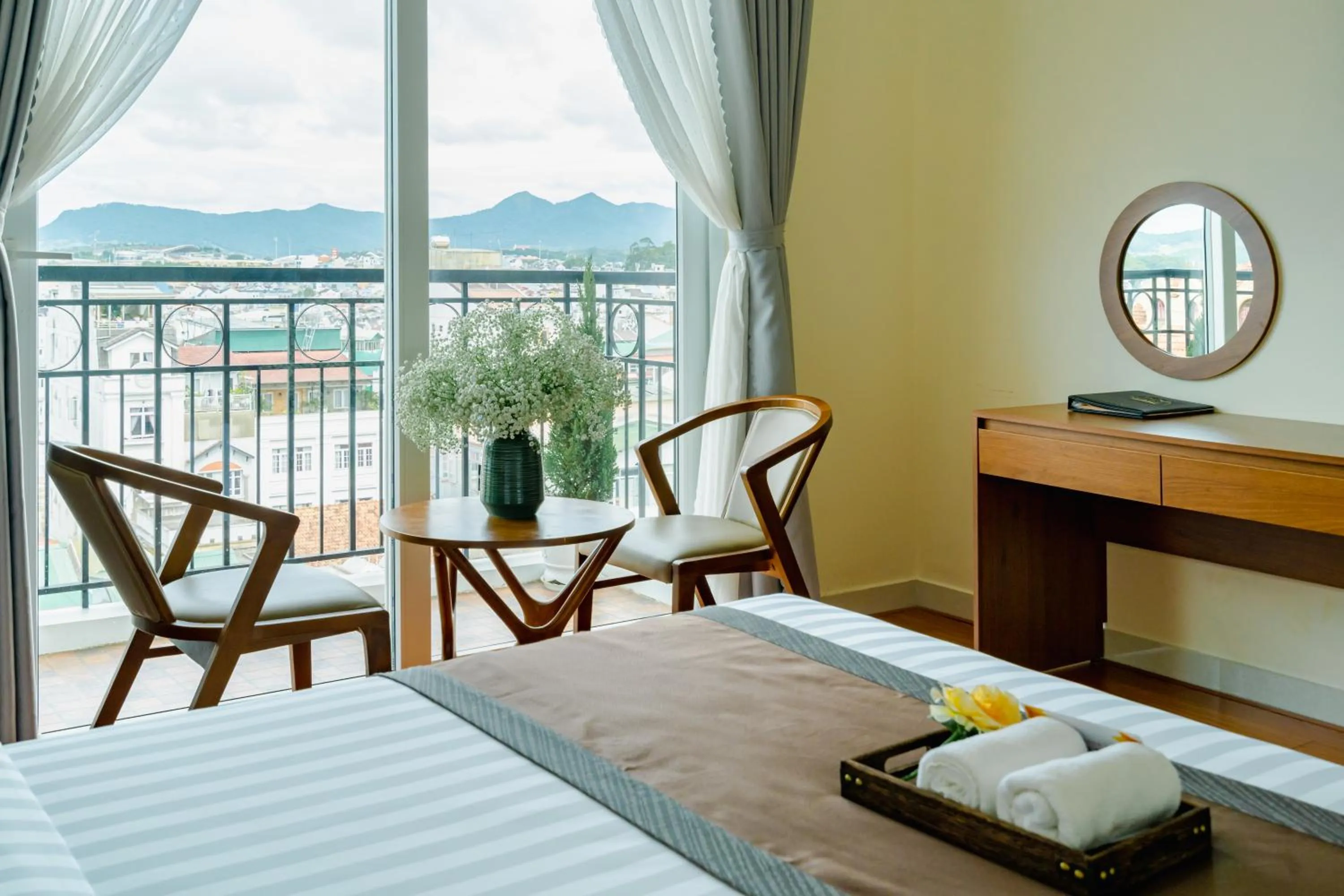 Property building, Bed in Bombo DaLat Hotel