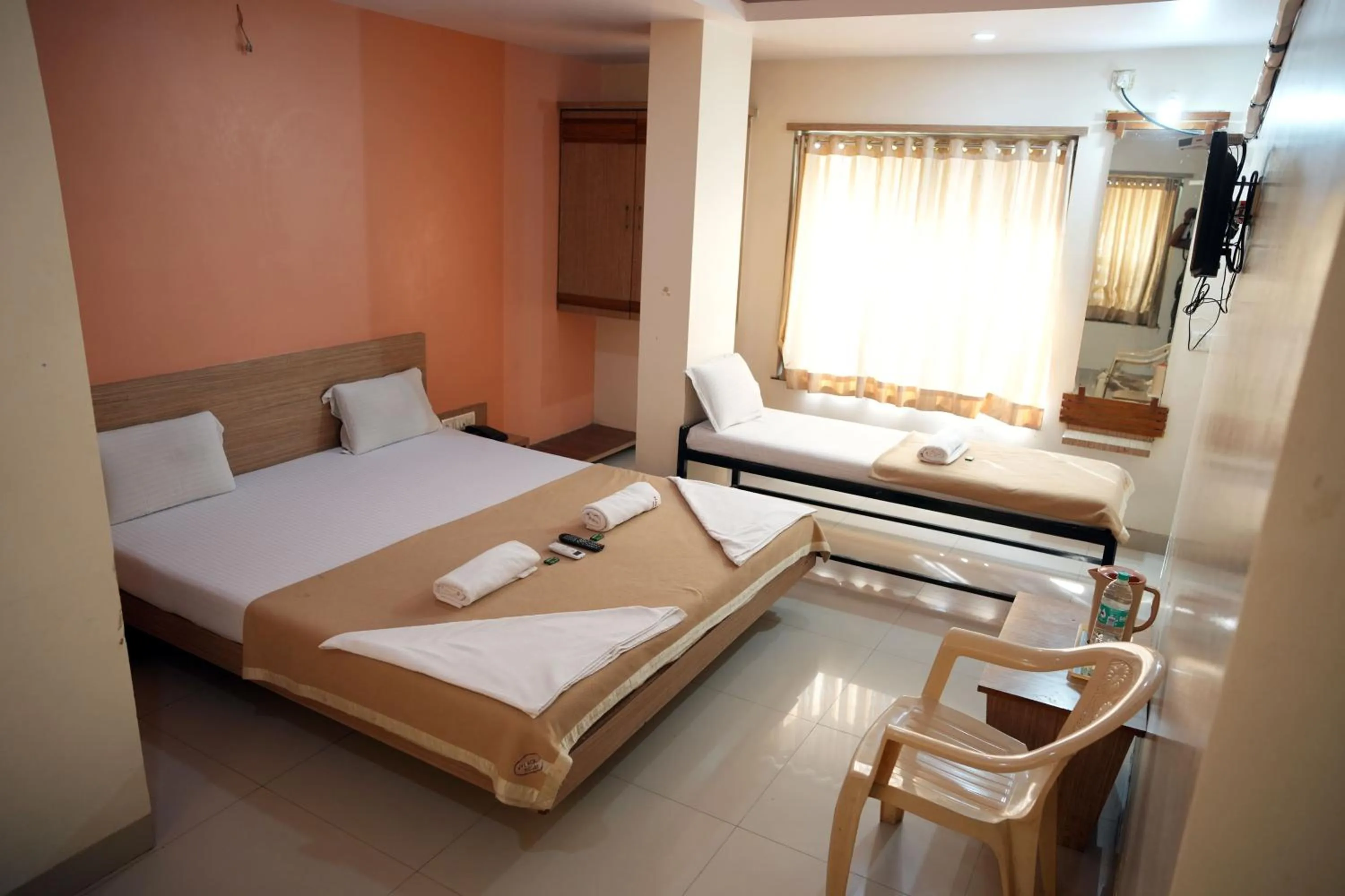 Bed in HOTEL SAI SURYA