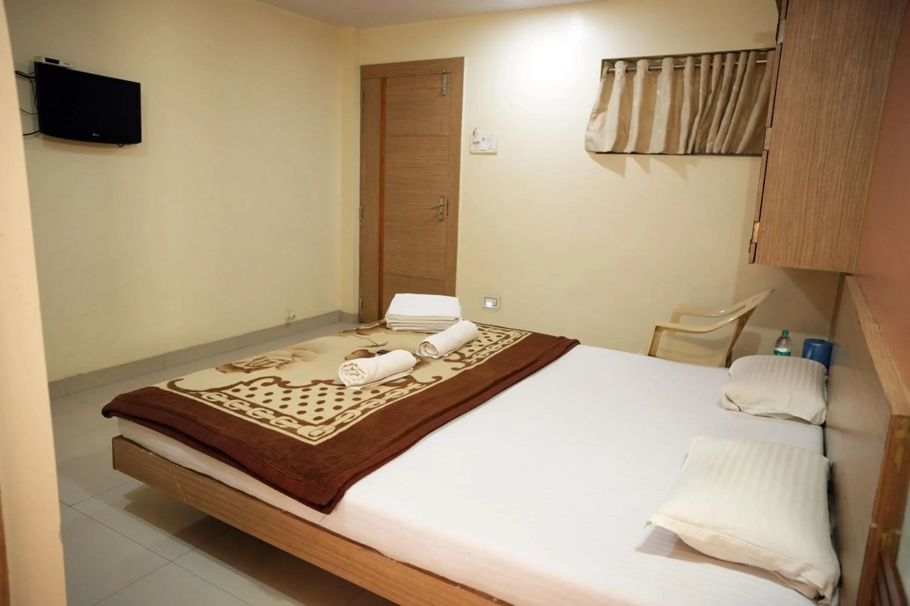 Bed in HOTEL SAI SURYA