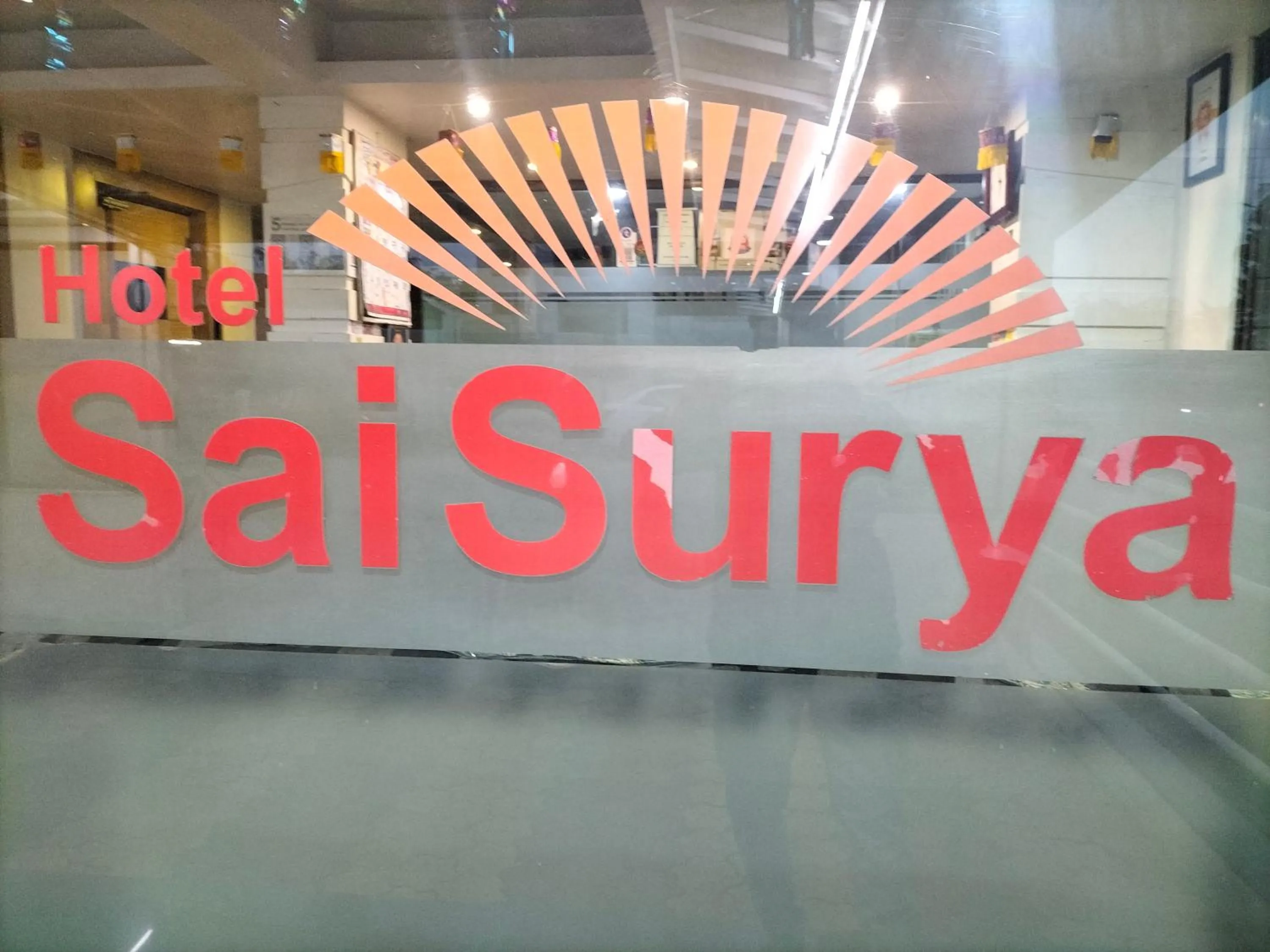 Property logo or sign in HOTEL SAI SURYA