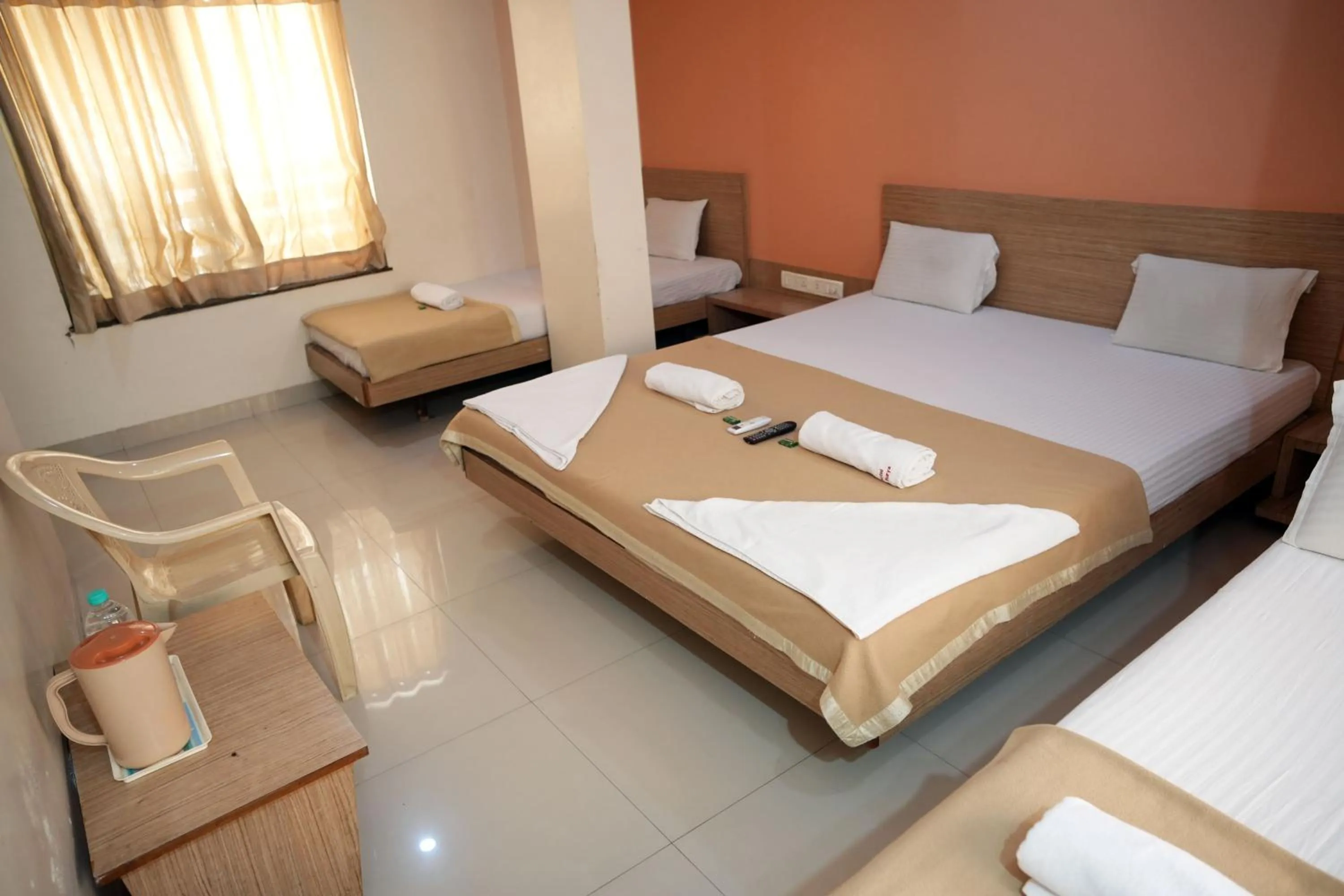 Bed in HOTEL SAI SURYA