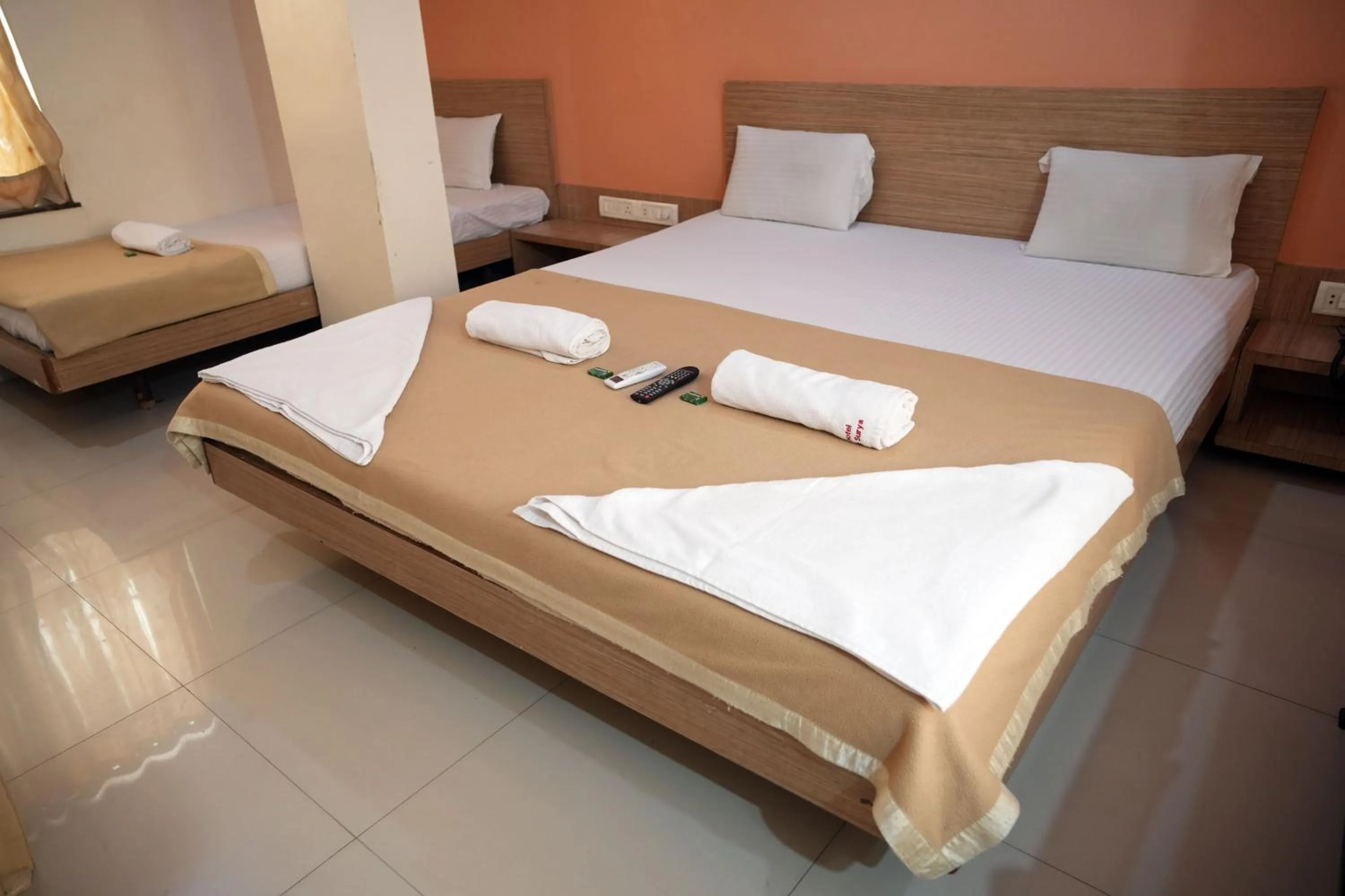 Bed in HOTEL SAI SURYA