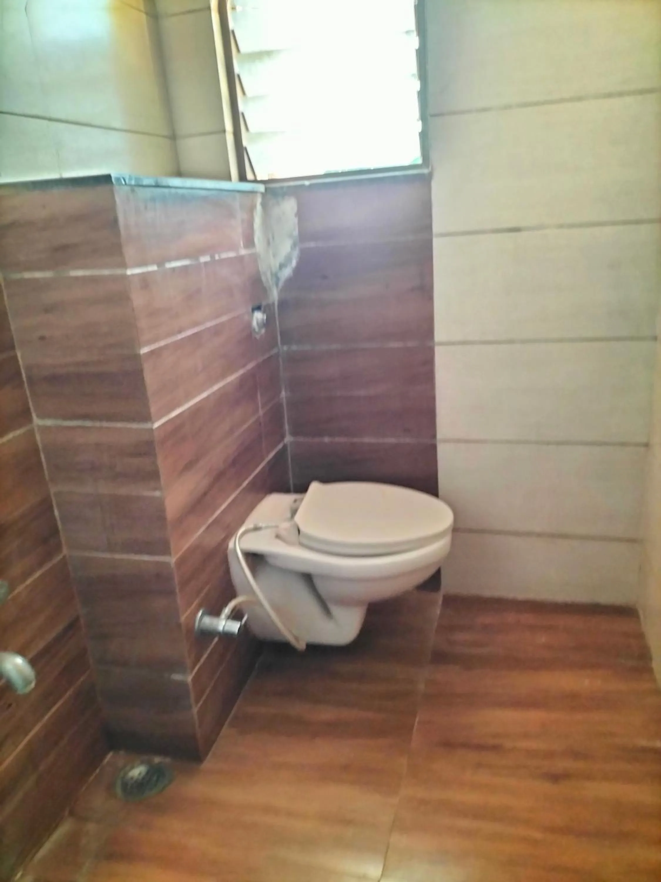 Toilet in HOTEL SAI SURYA