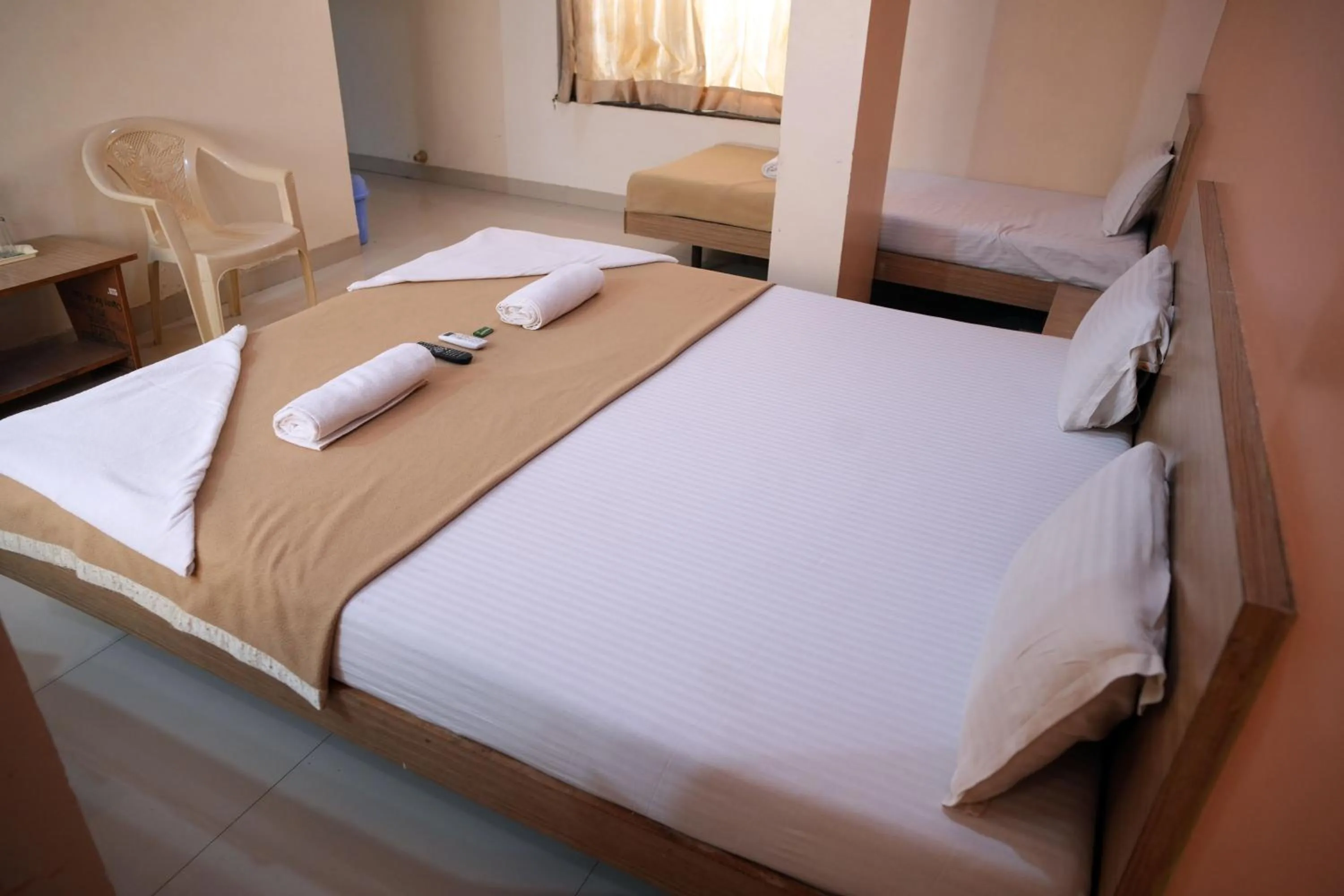 Bed in HOTEL SAI SURYA