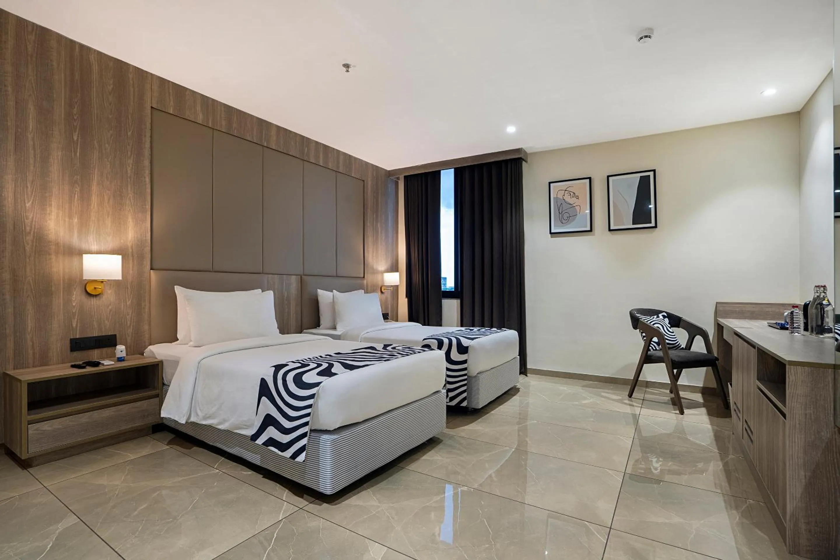 Bed in Sunday Hotel Vadodara