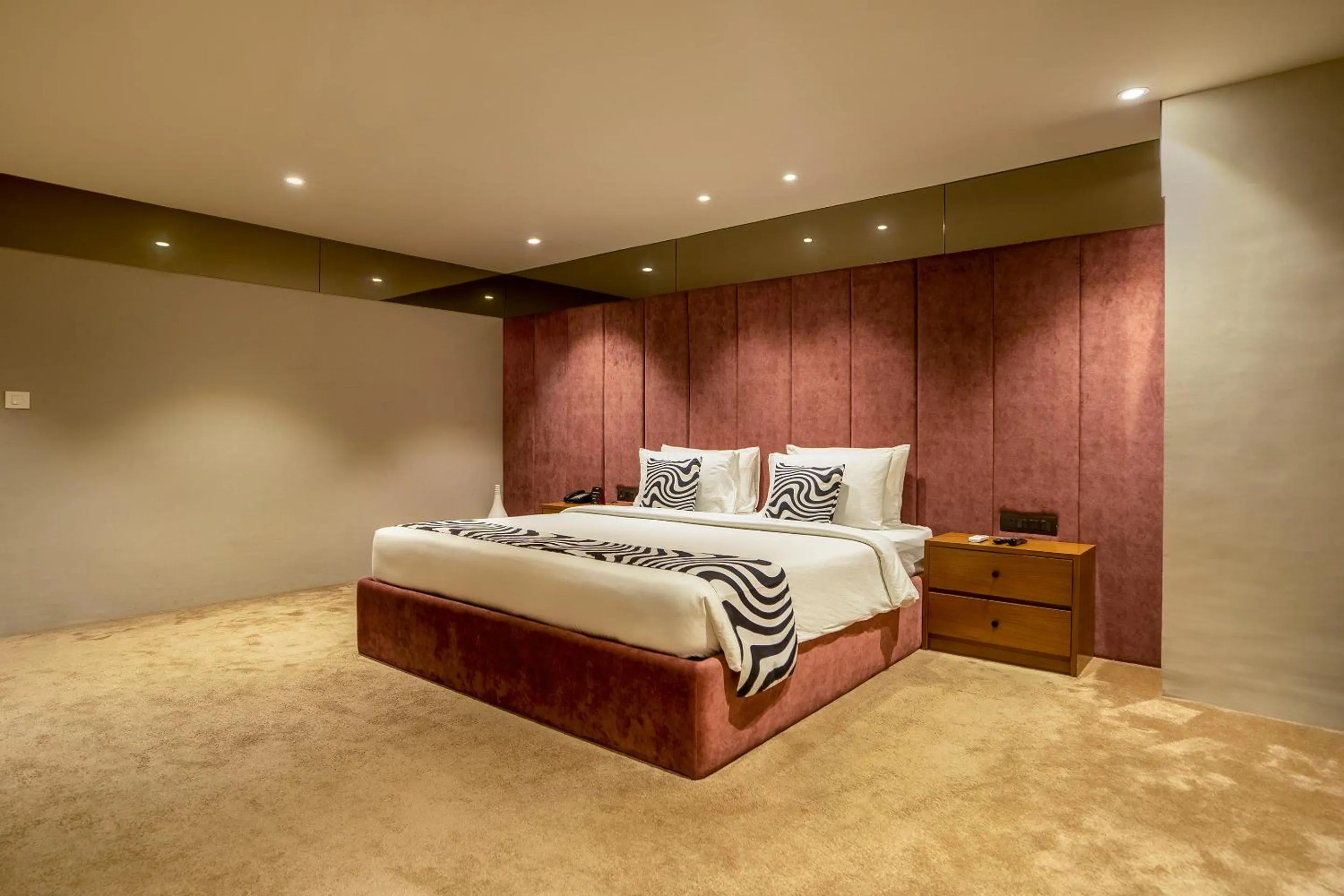 Bed in Sunday Hotel Vadodara