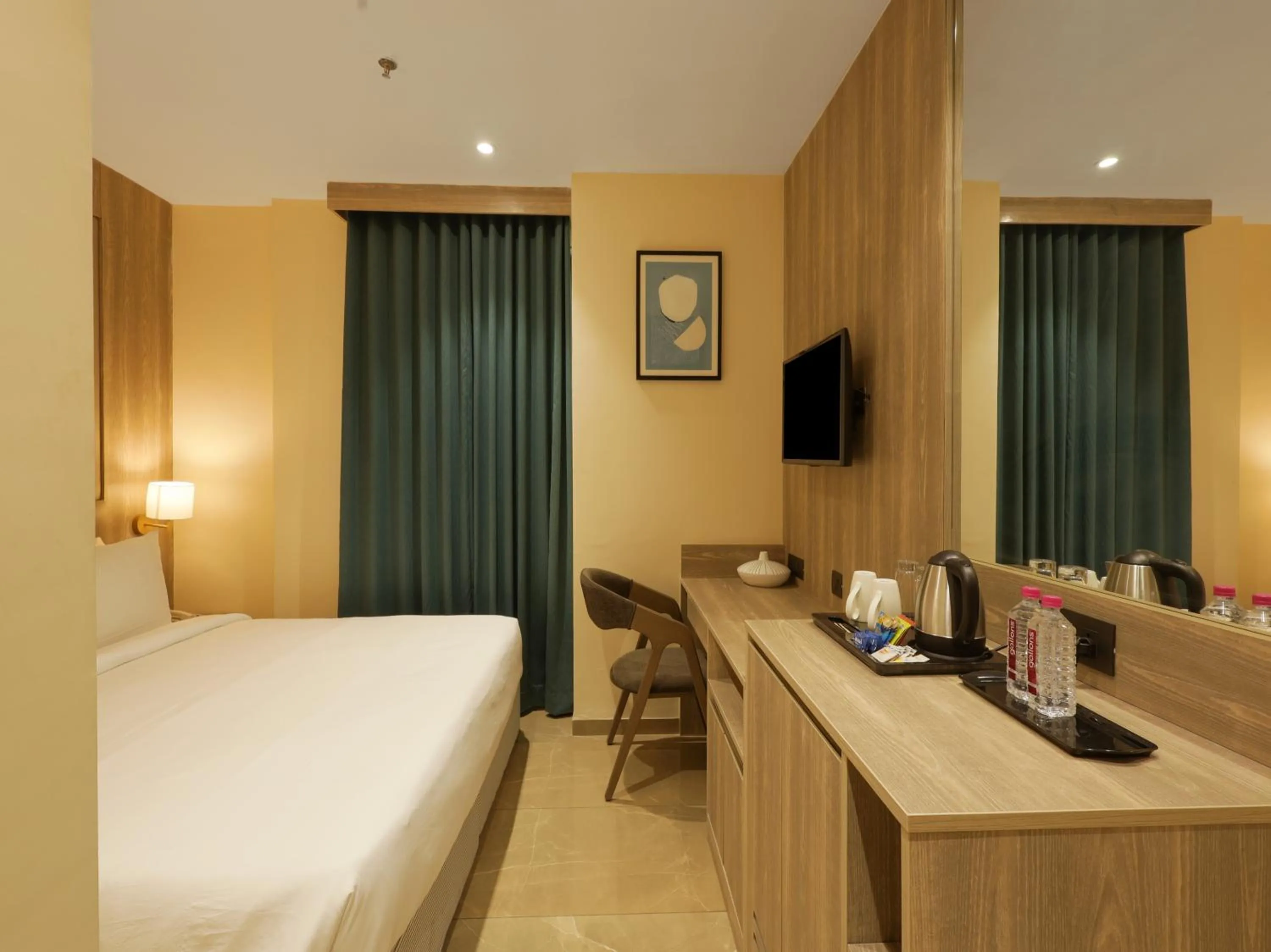 Photo of the whole room, Bed in Sunday Hotel Vadodara