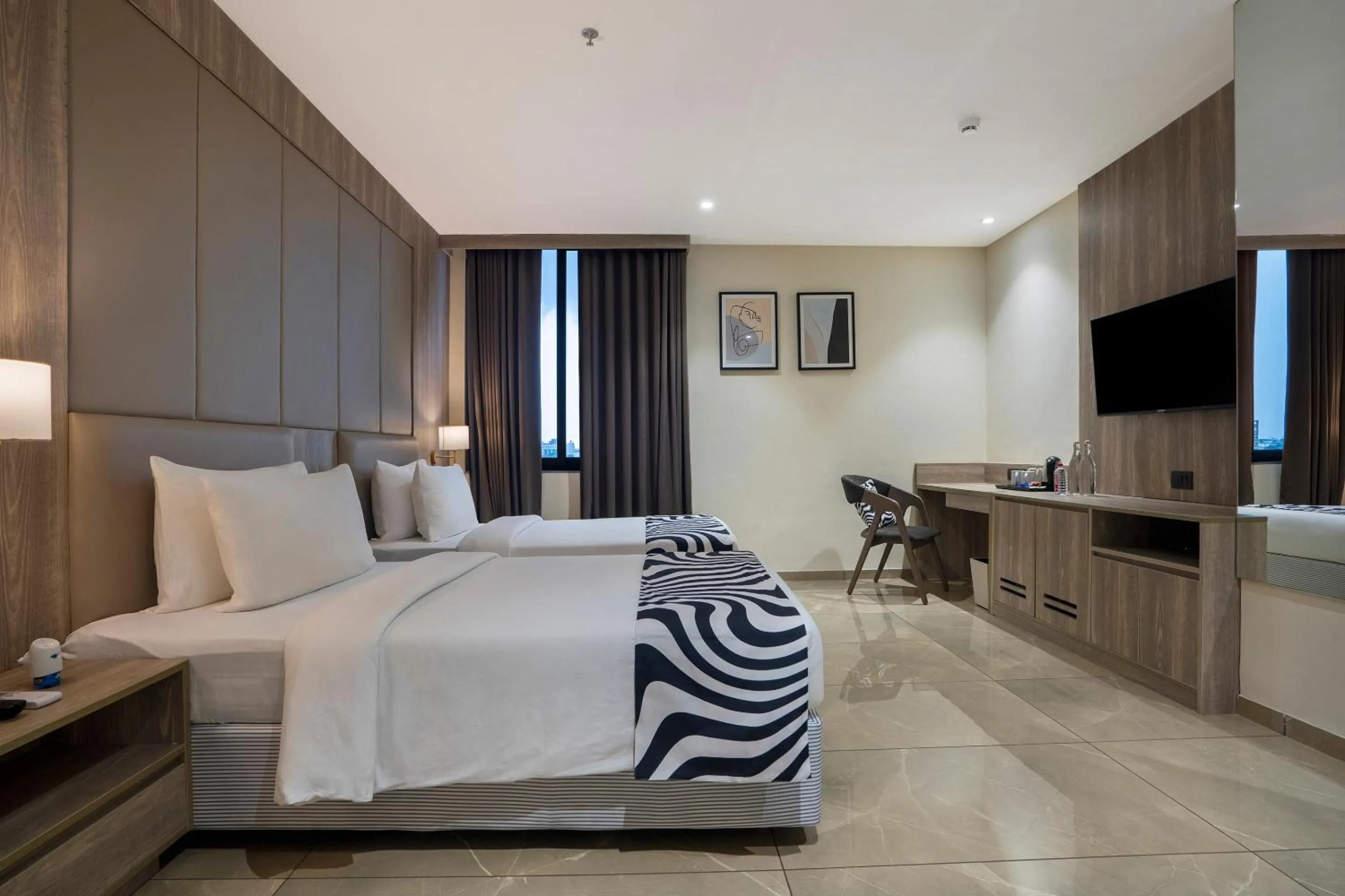 Bed in Sunday Hotel Vadodara