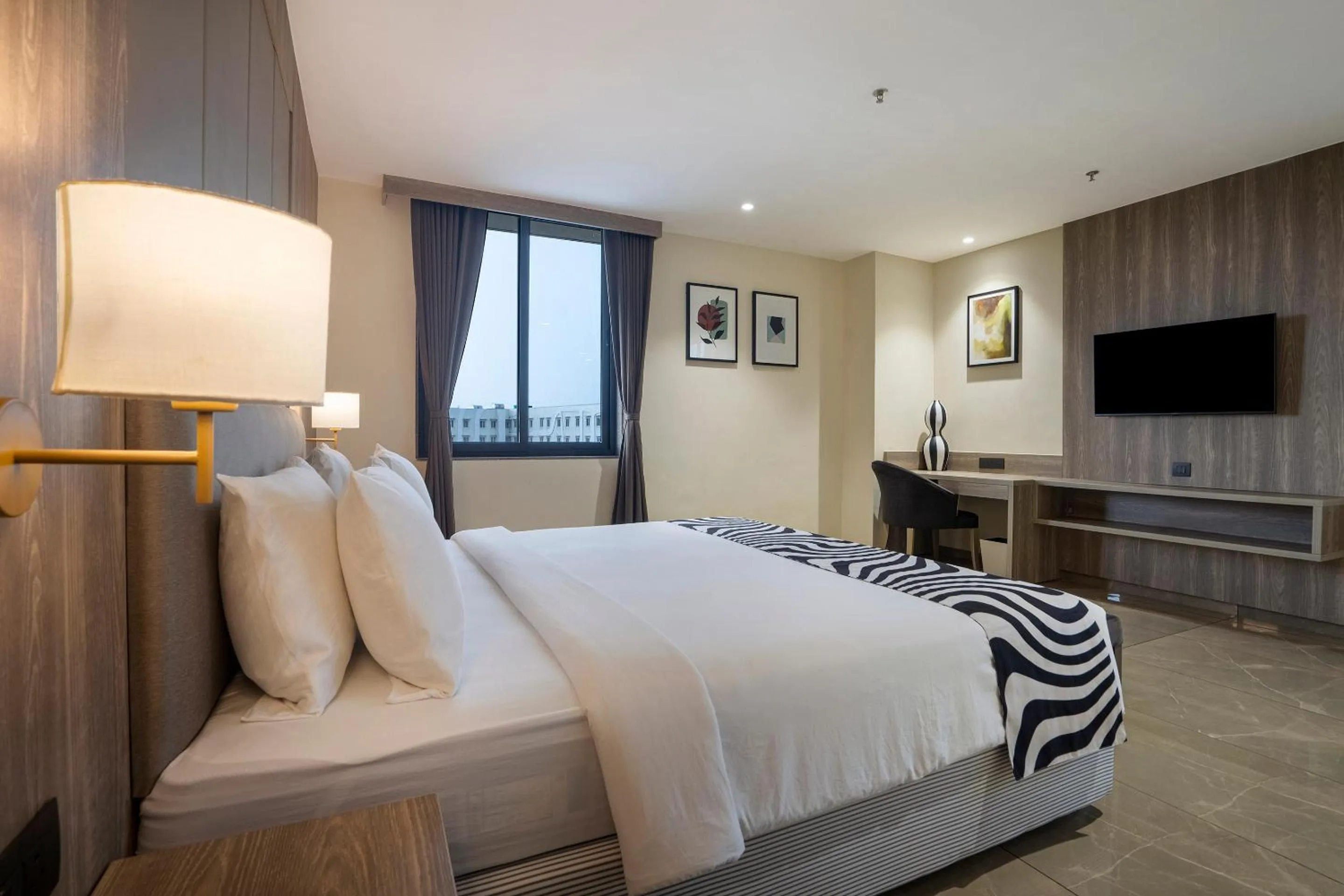 Bed in Sunday Hotel Vadodara