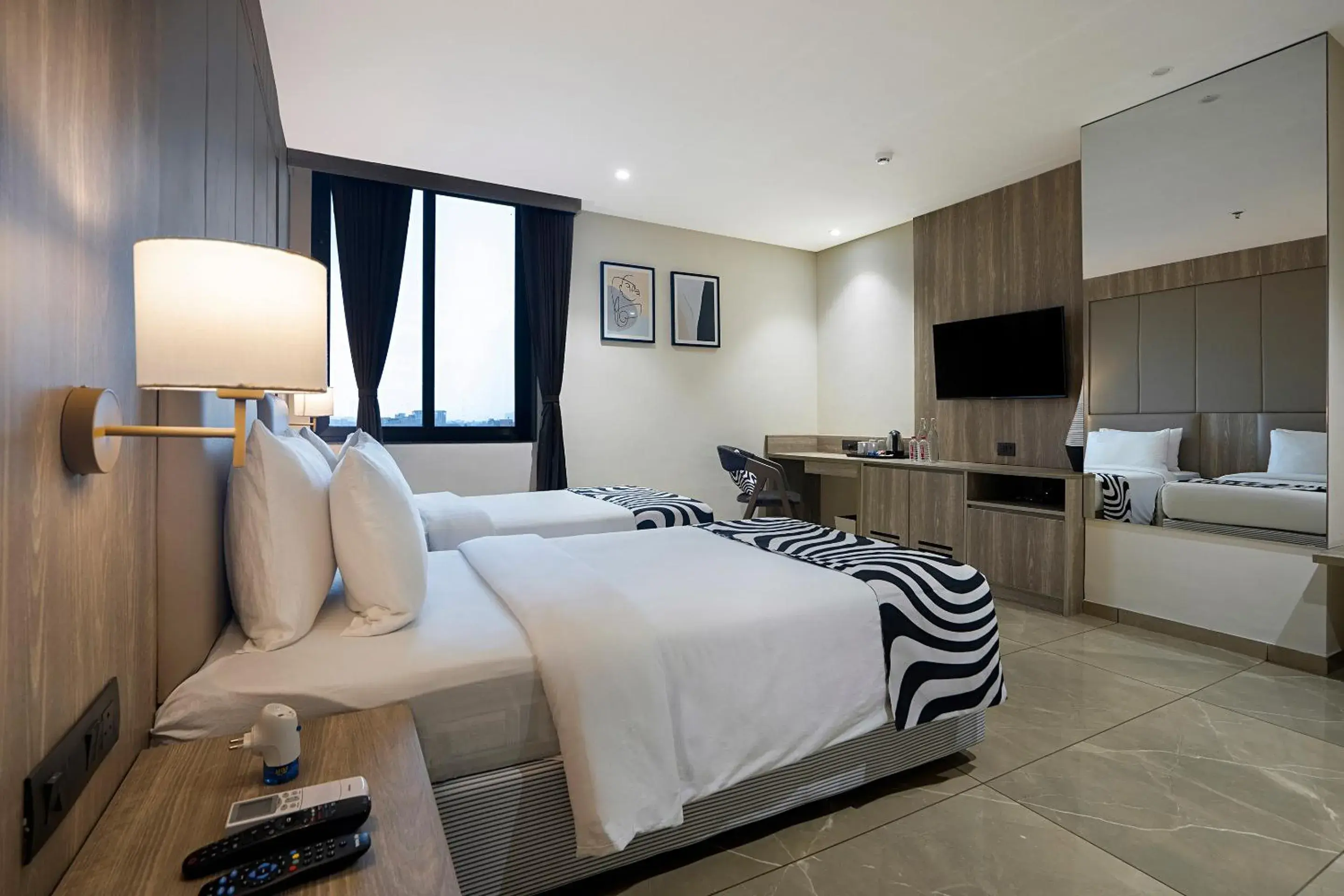 Photo of the whole room, Bed in Sunday Hotel Vadodara Photo of the whole room, Bed in Sunday Hotel Vadodara