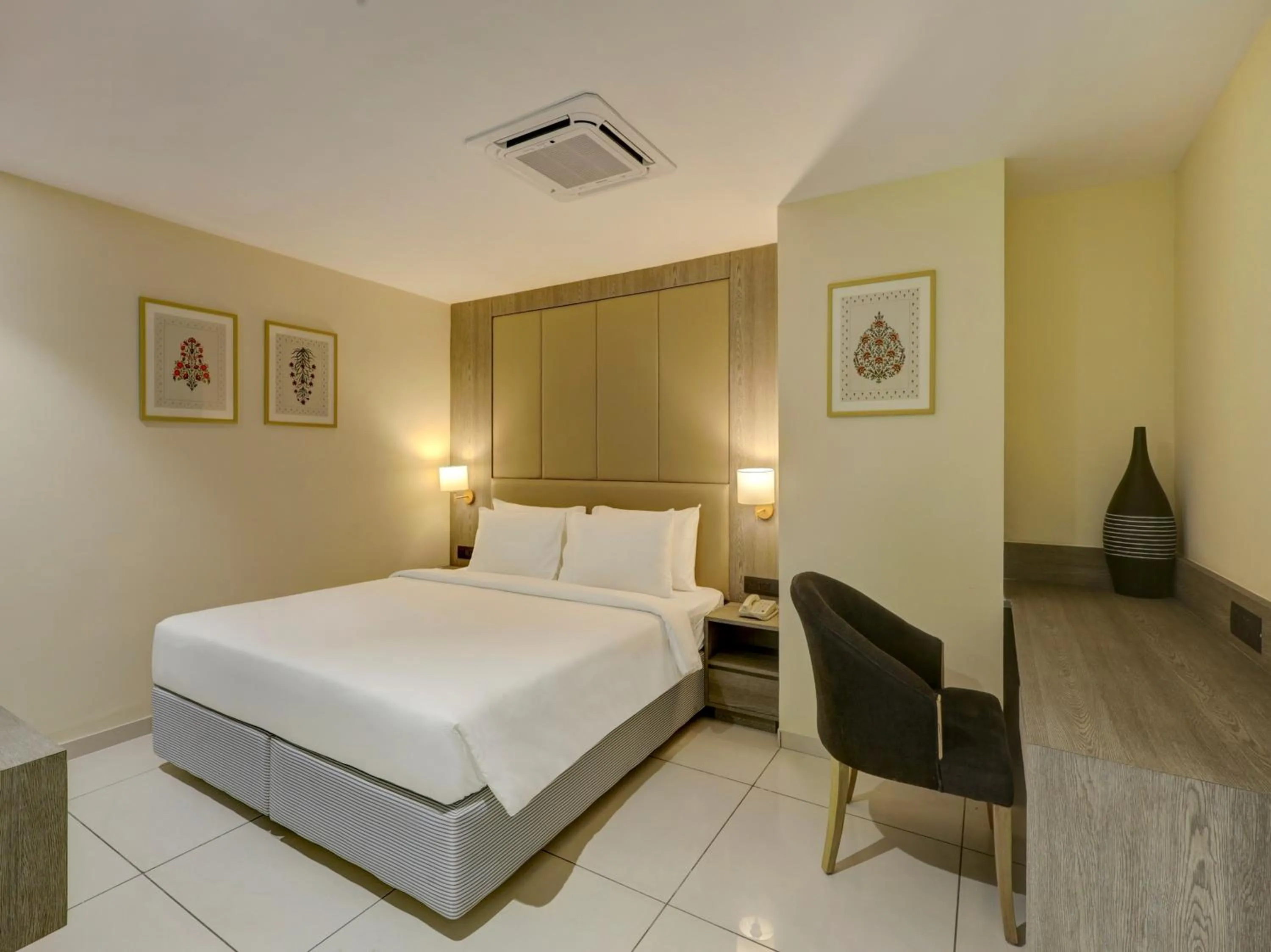 Bed in Sunday Hotel Vadodara