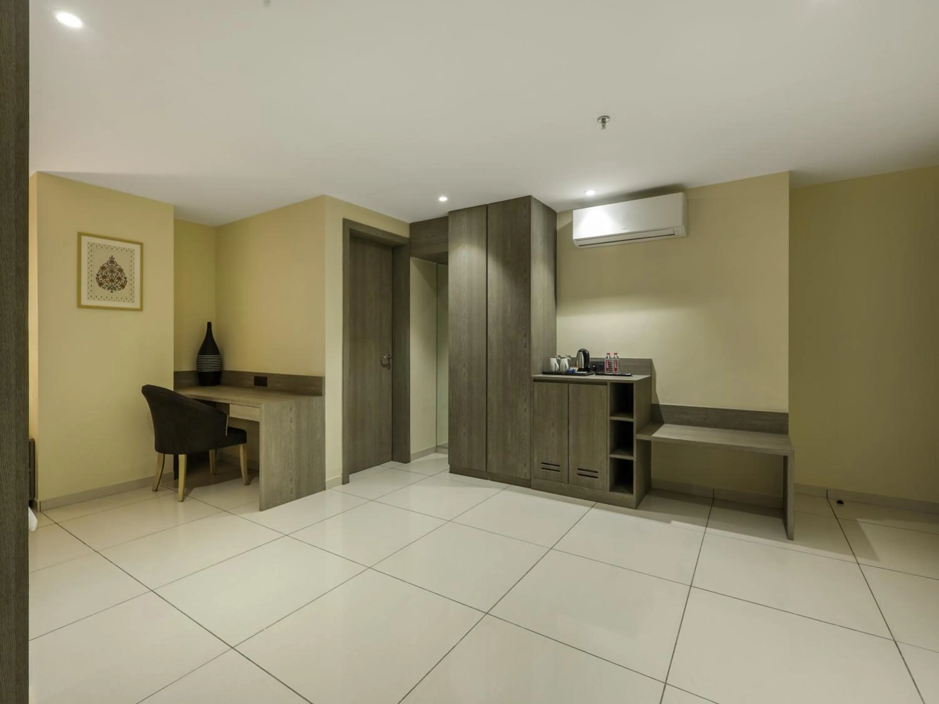 Kitchen or kitchenette in Sunday Hotel Vadodara