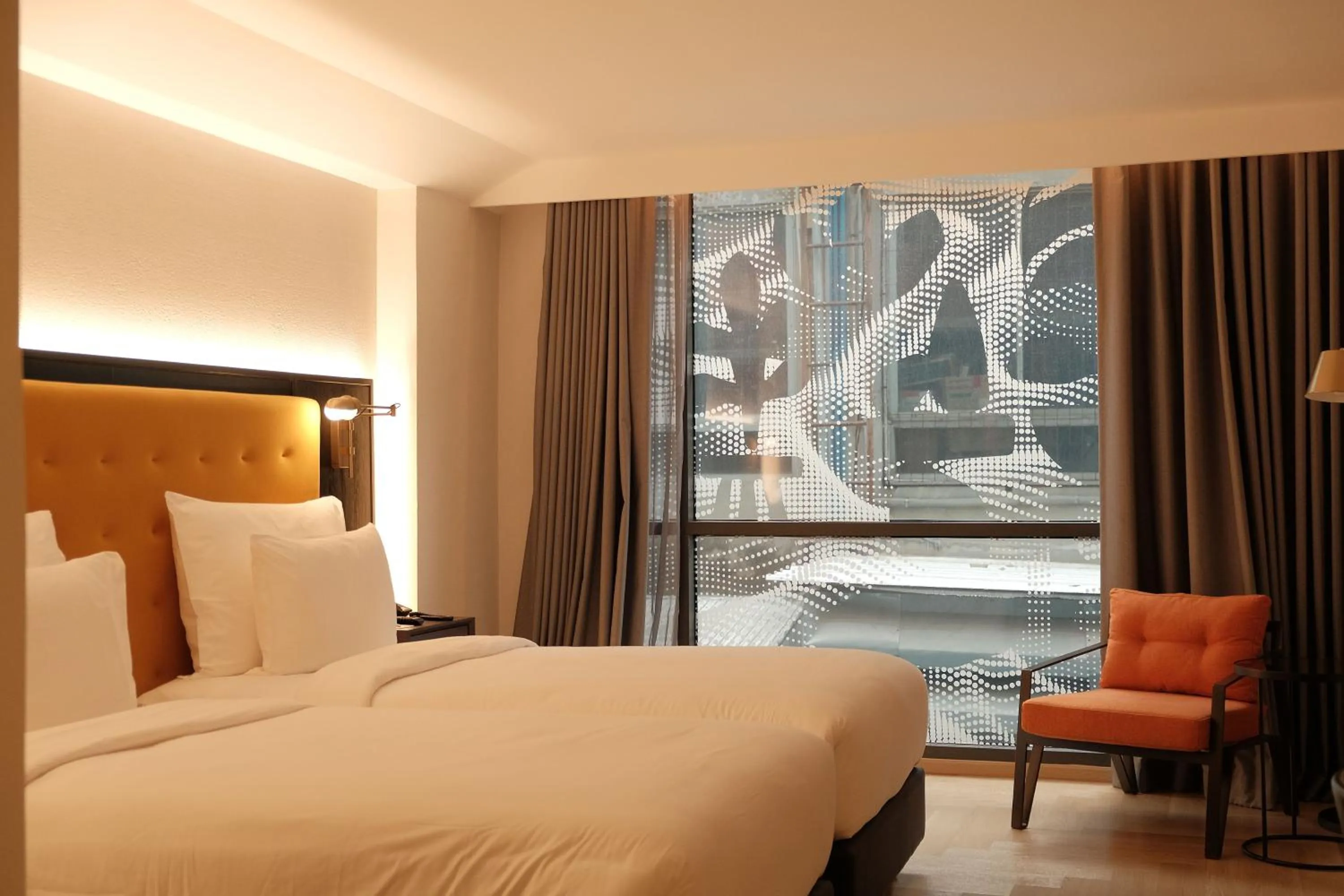 Bed in Public House Bangkok, a Member of Design Hotels