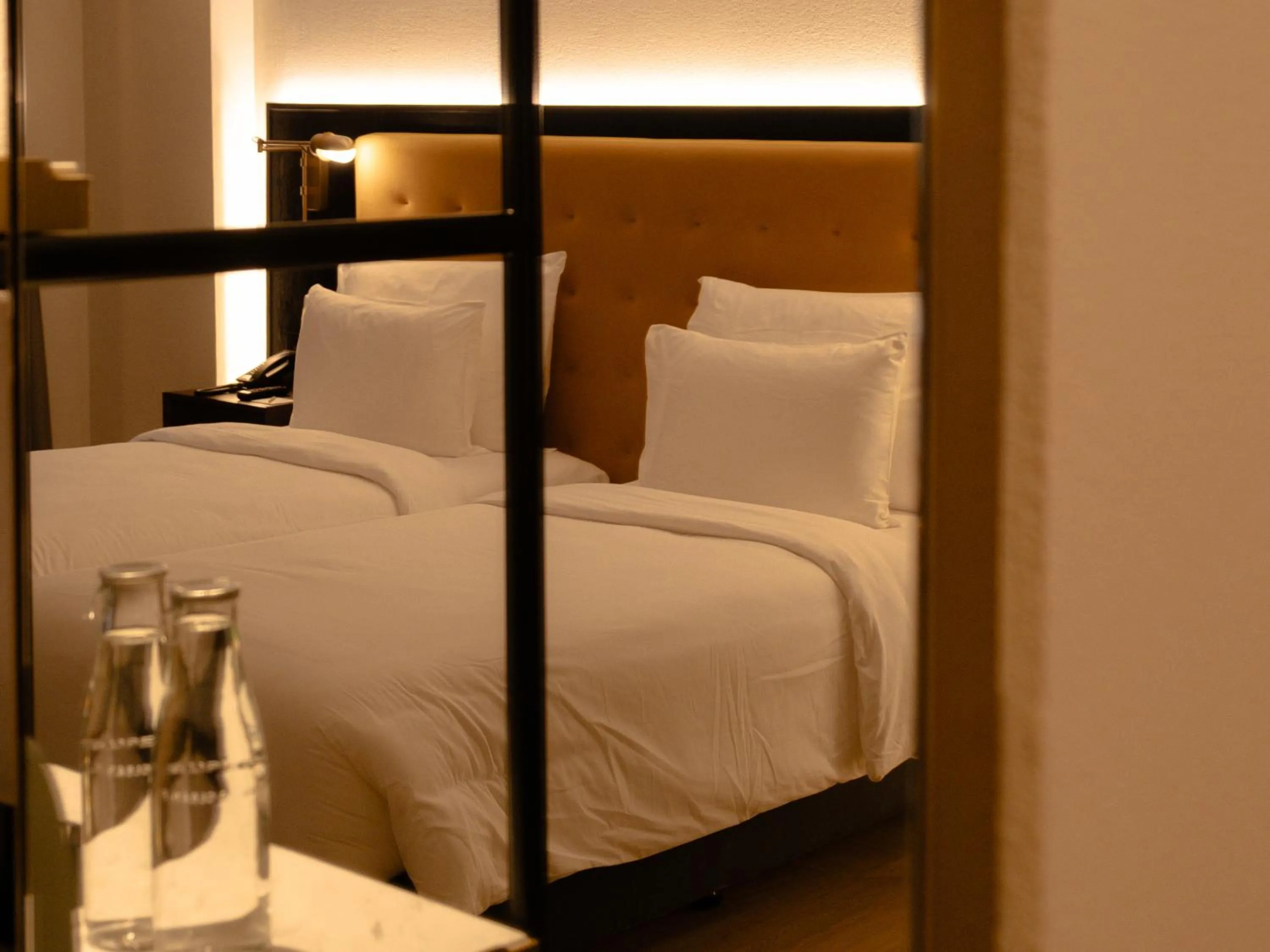 Bed in Public House Bangkok, a Member of Design Hotels