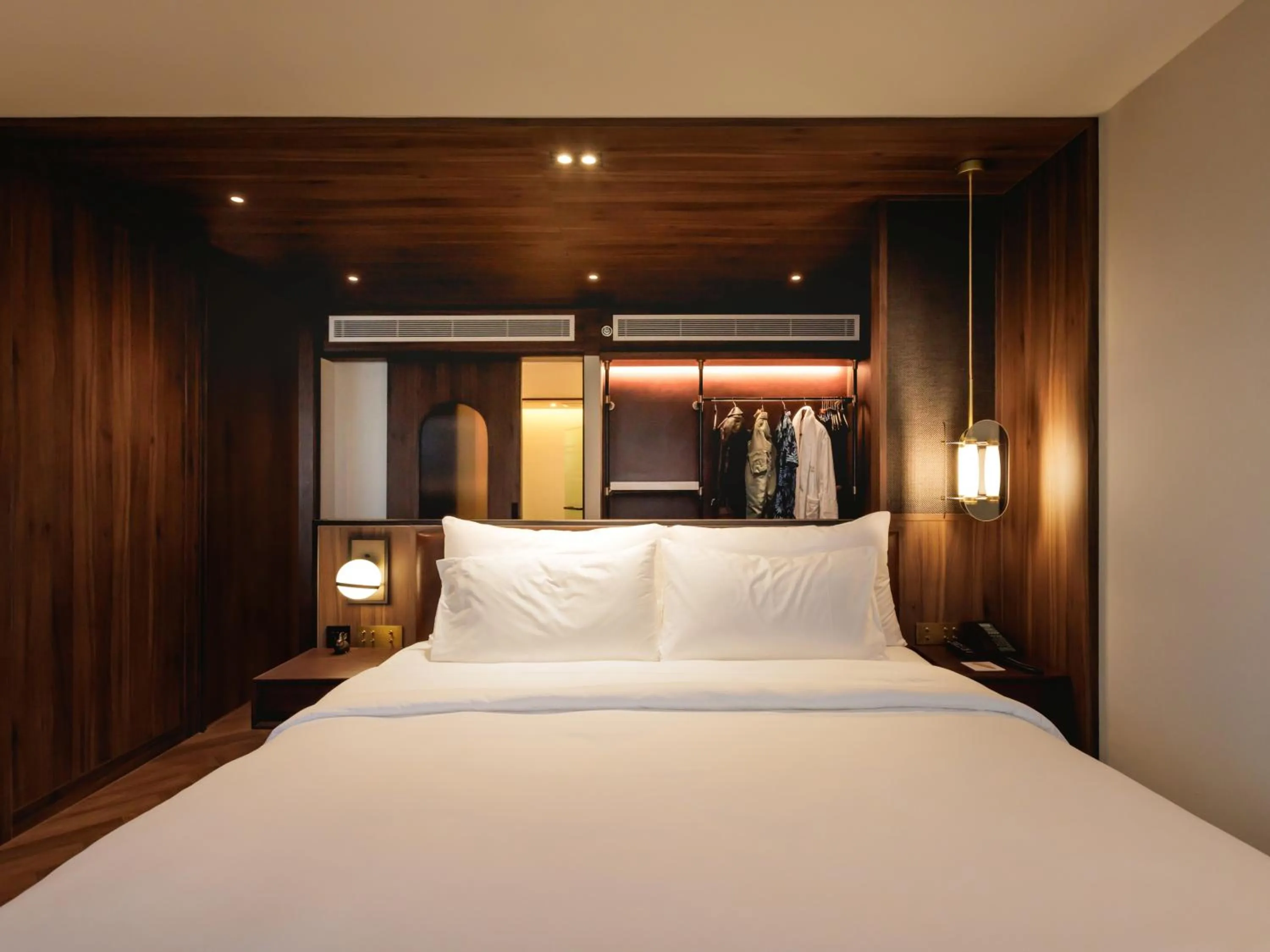 Bed in Public House Bangkok, a Member of Design Hotels