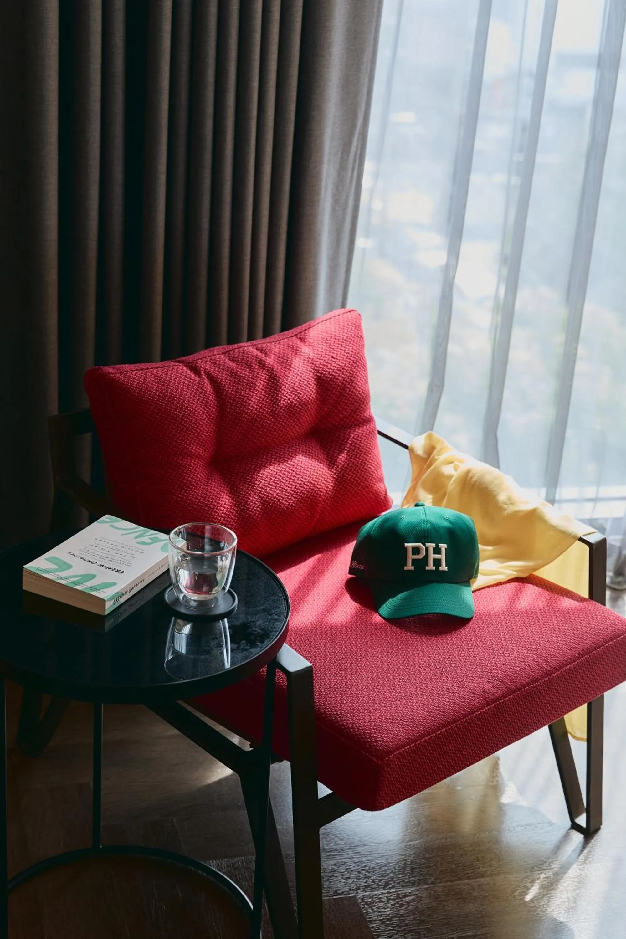 Seating area in Public House Bangkok, a Member of Design Hotels